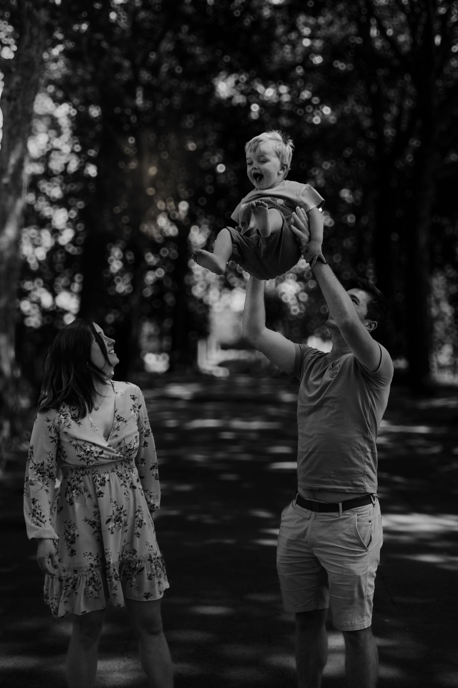 Family photography session in Surrey countryside – joyful candid family moment captured at sunset