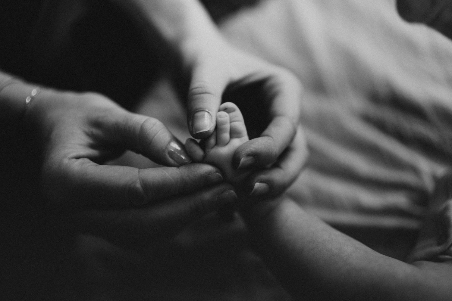 Tender motherhood moment captured during family photography session in Vancouver