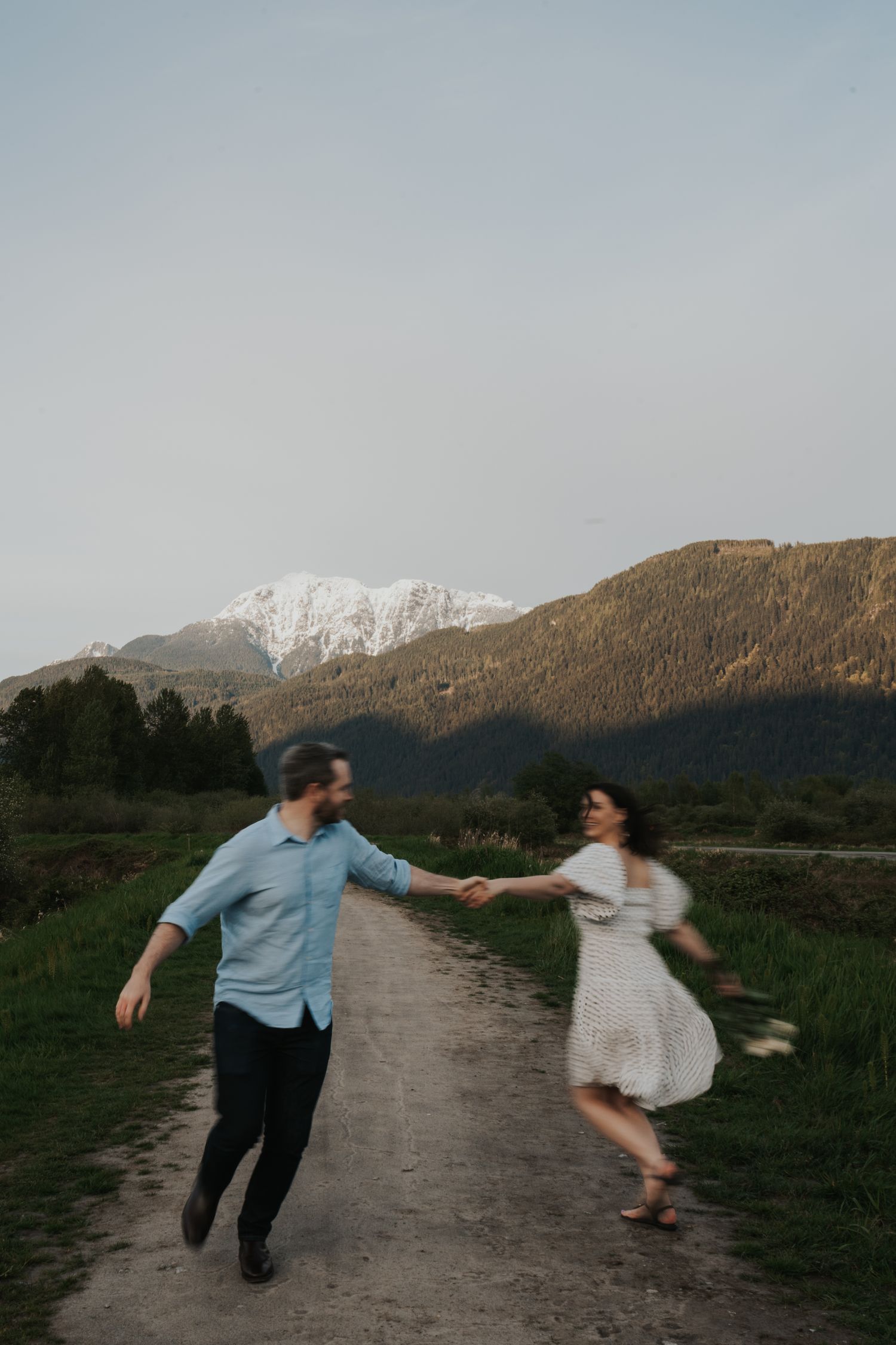 Candid couple portrait during golden hour engagement session in the Fraser Valley