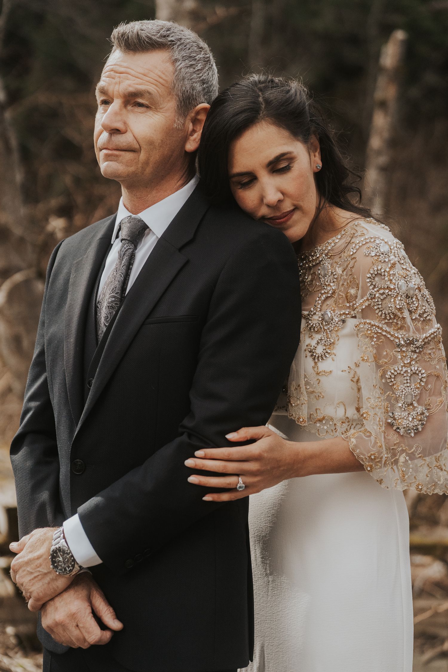 Documentary style wedding moment between bride and groom in Whistler