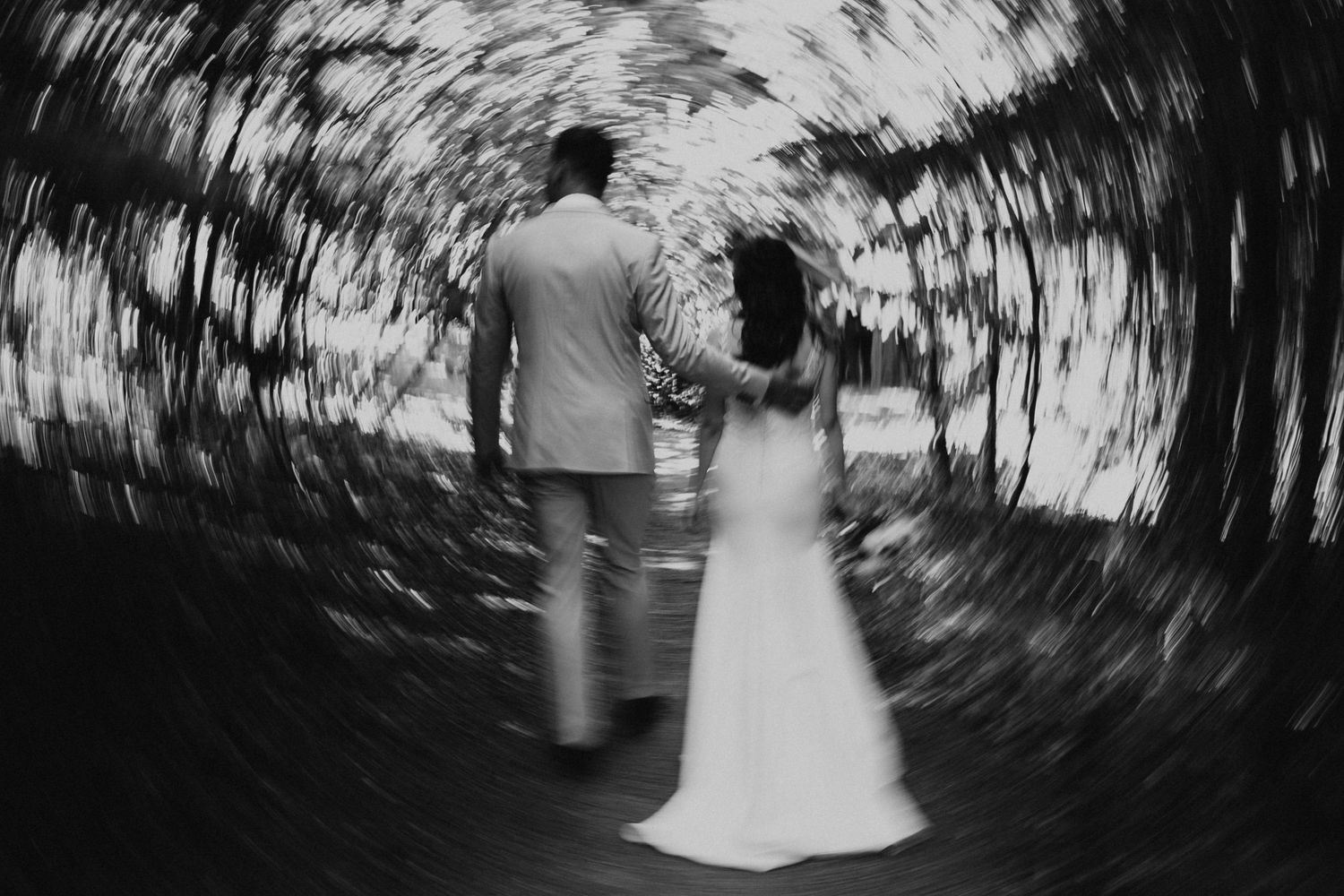 Documentary style wedding moment between bride and groom in Whistler