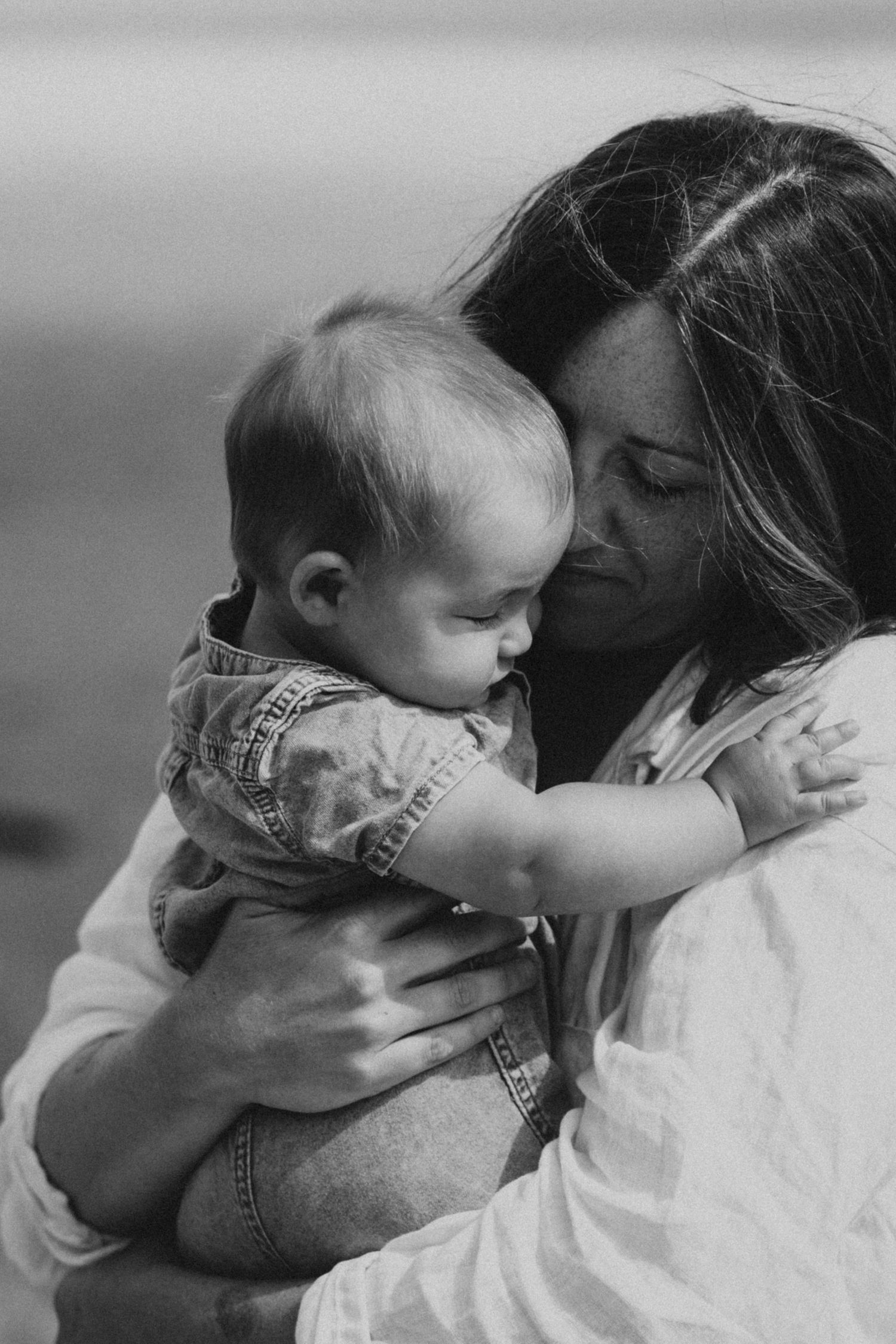 Tender motherhood moment captured during family photography session in Vancouver