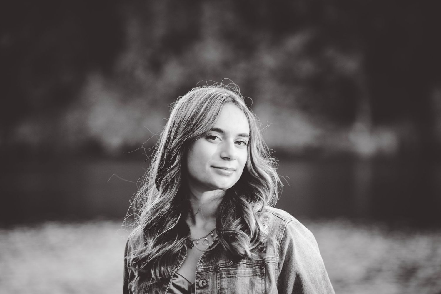 Black and white portrait series showing relaxed poses and natural expressions.