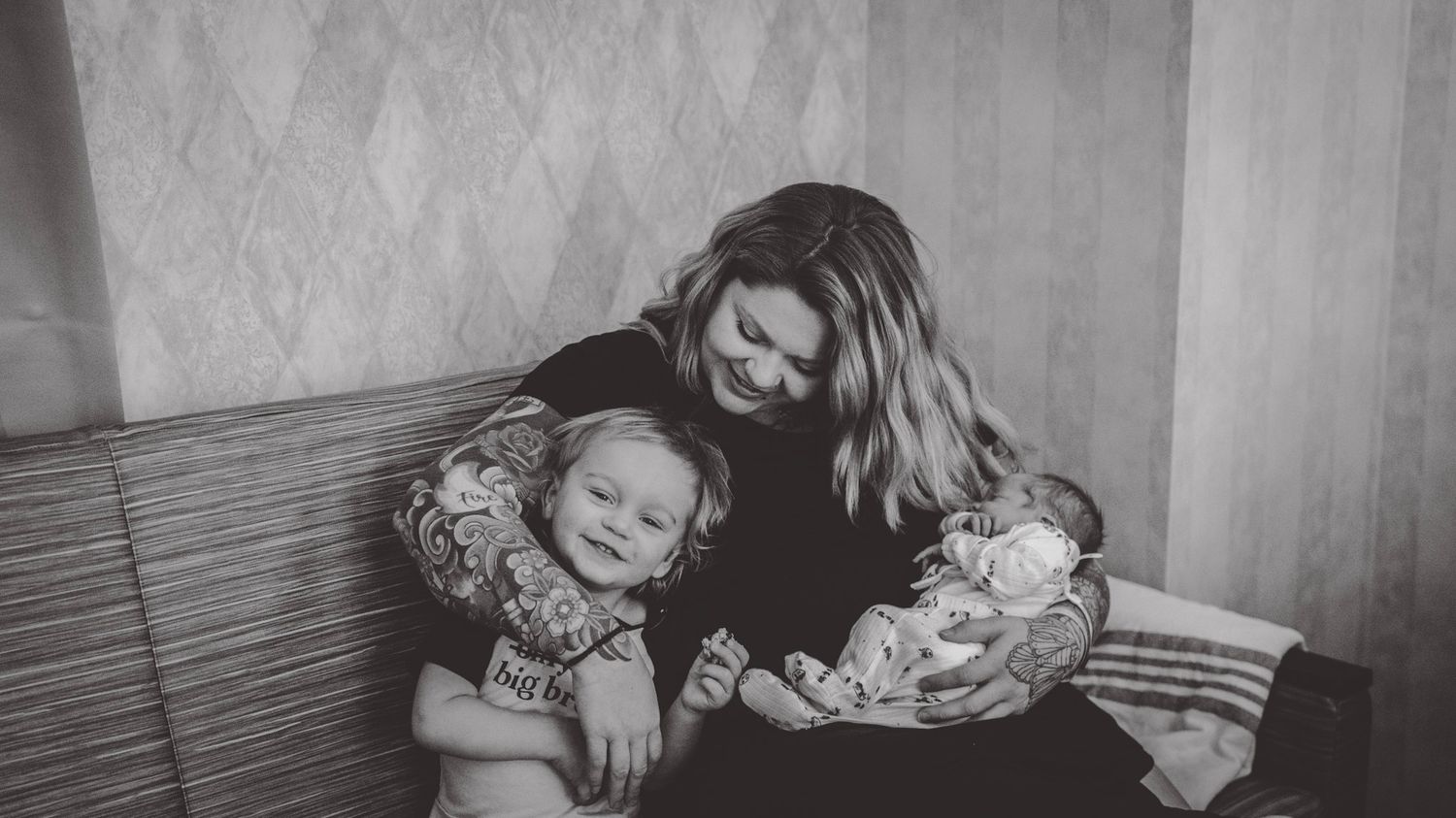 Black and white photo sequence showing tender moments with a newborn.