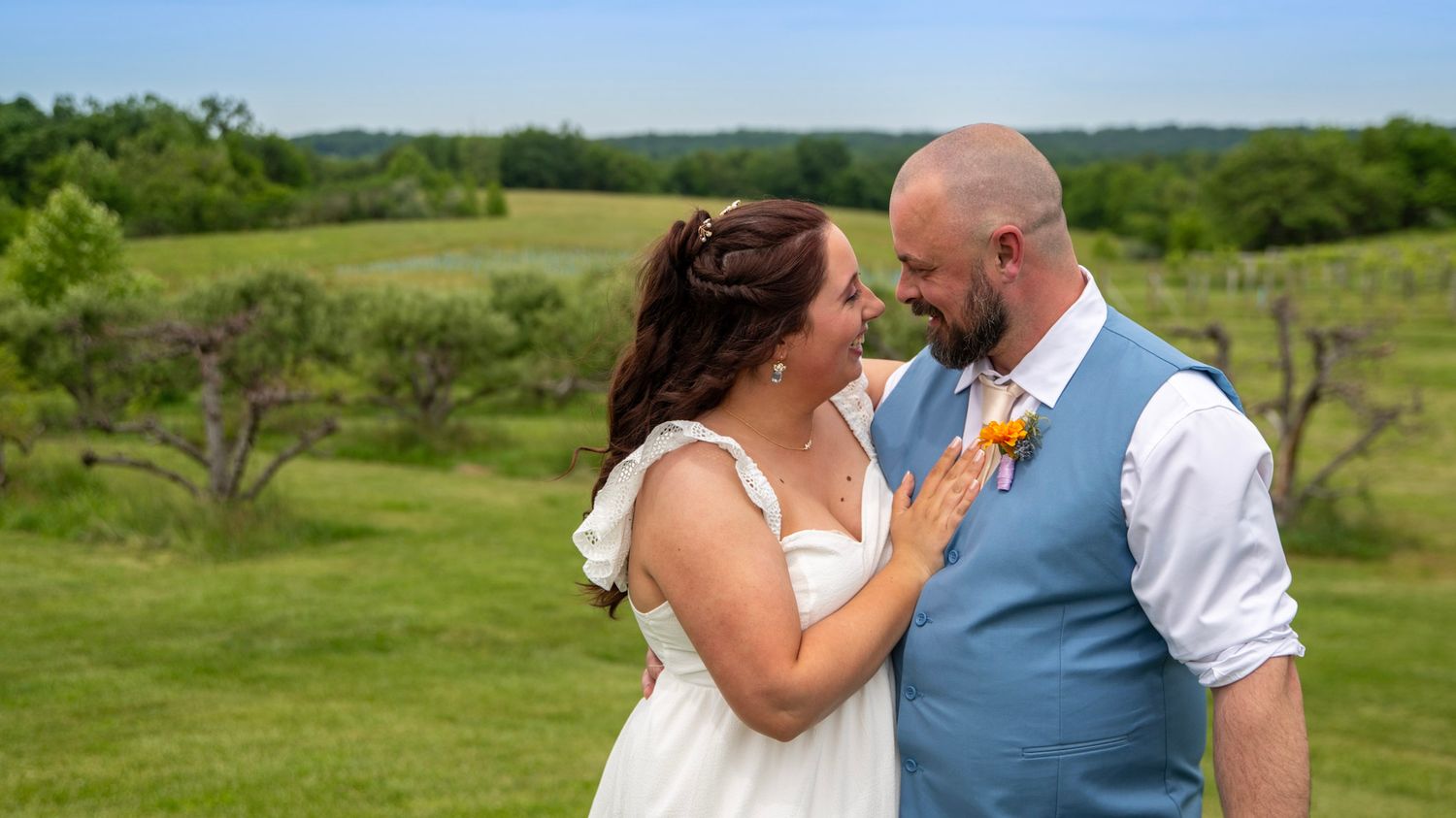 Panoramic wedding photos showing romantic moments in a beautiful countryside setting.