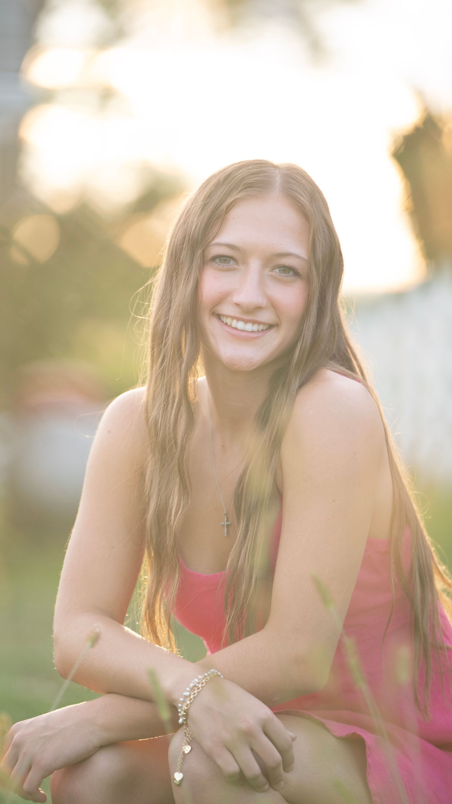 Candid sunset portrait with warm golden lighting and natural expressions.
