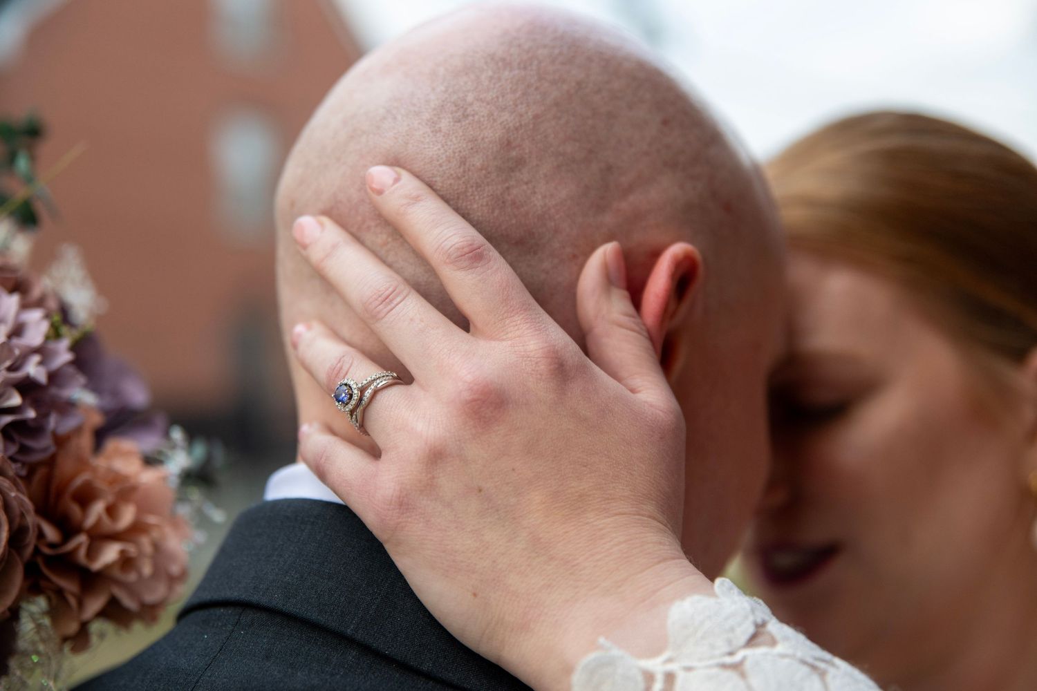 Intimate wedding moment captured with romantic floral decor.