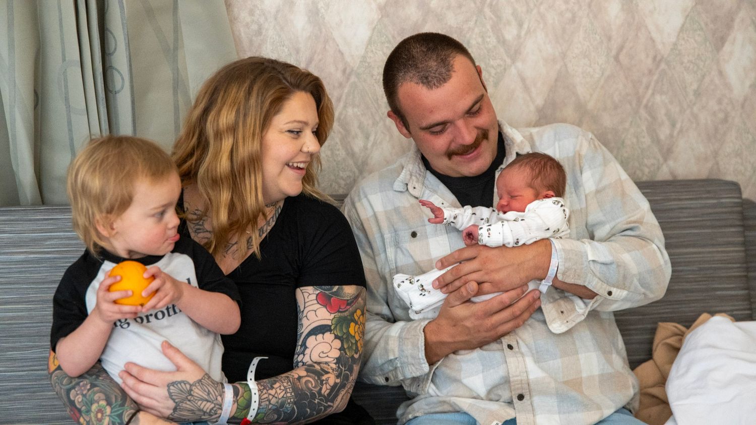Family photo series showing parents and child bonding with their newborn baby.