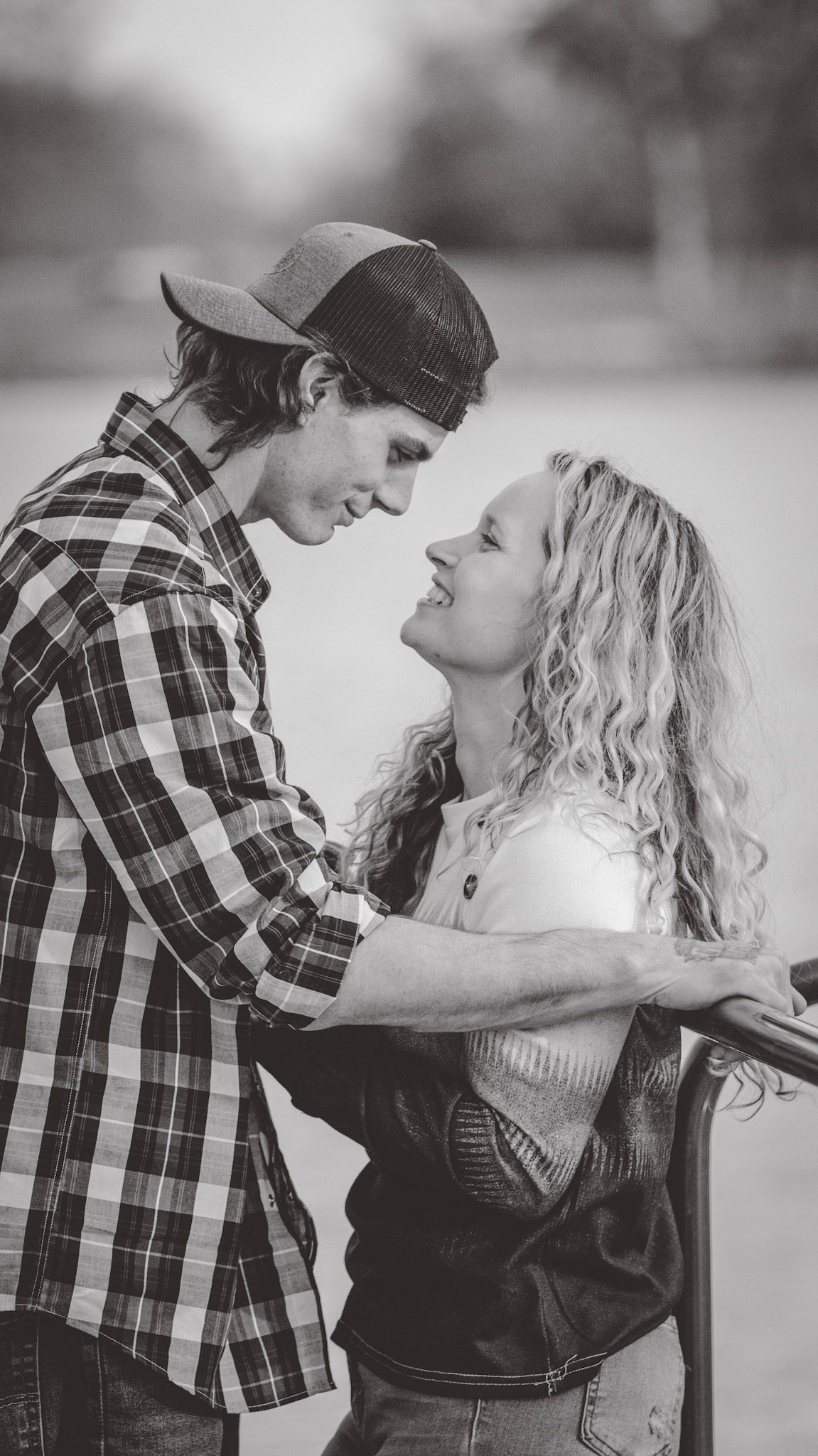 Black and white series of playful romantic interactions between a couple.