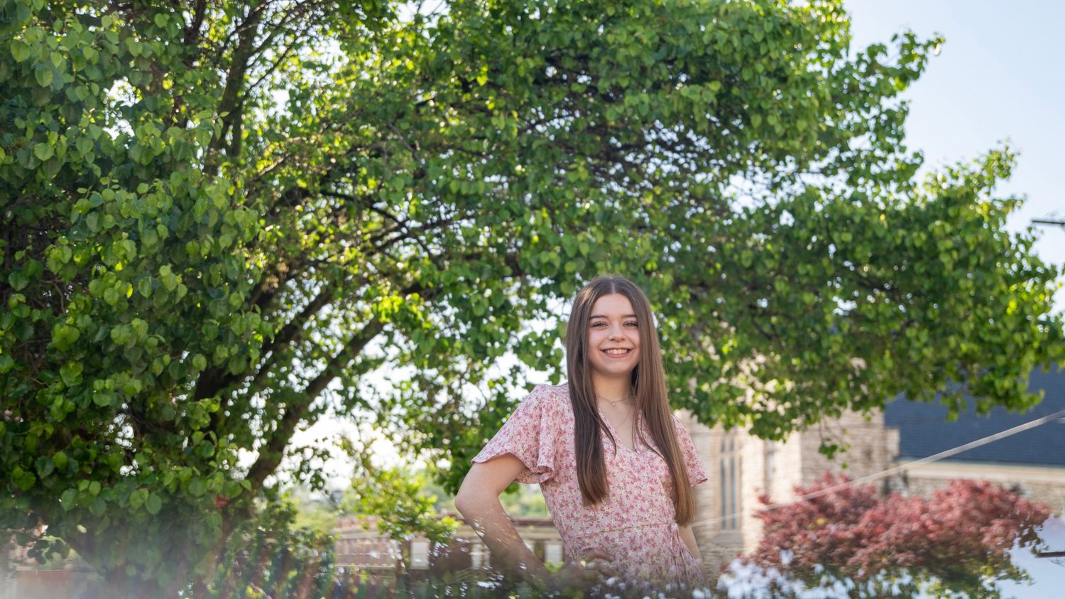 Spring garden portraits with blooming trees and natural sunlight.