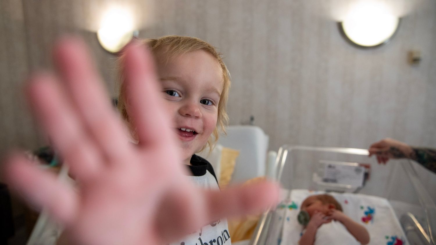 Series of joyful expressions and interactions in a hospital setting.