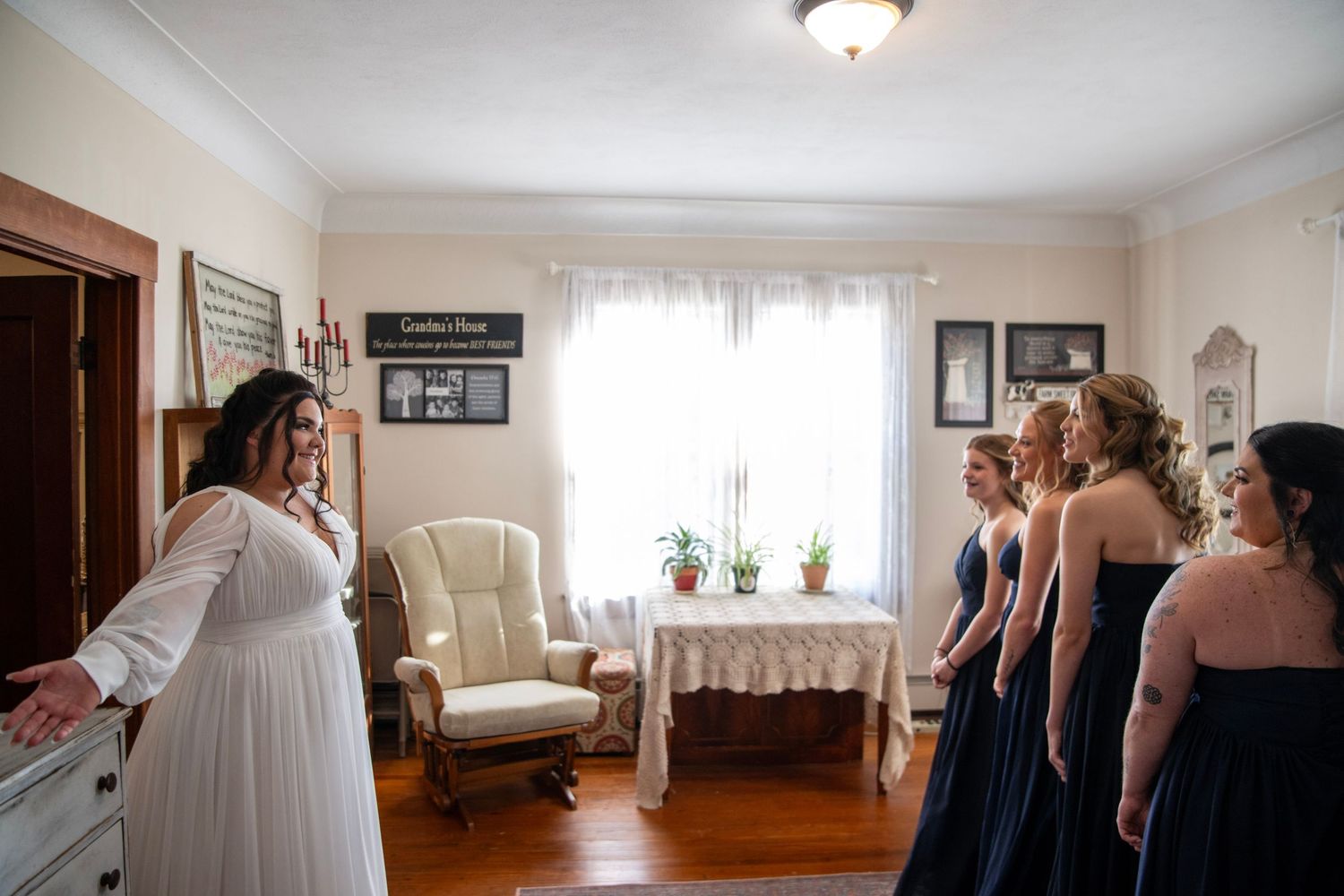 Wide angle view of wedding preparation room with natural lighting.