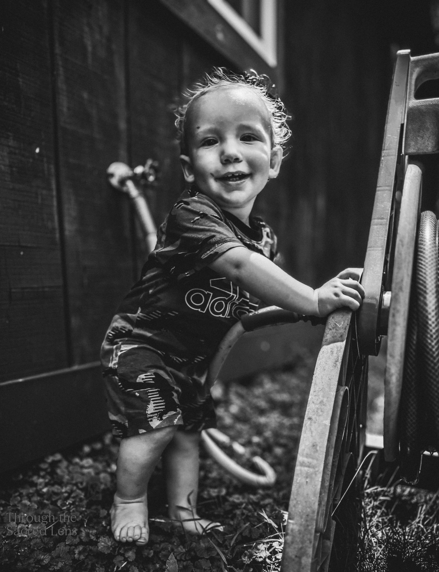 Black and white series showing playful moments of childhood.