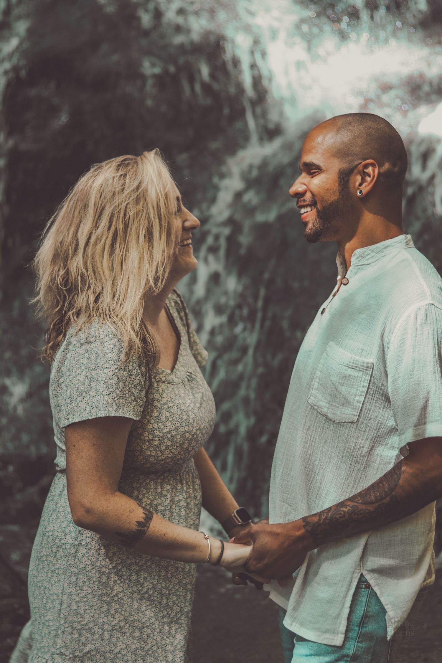 A romantic couple shares tender moments in a series of intimate outdoor photos against a misty natural backdrop.