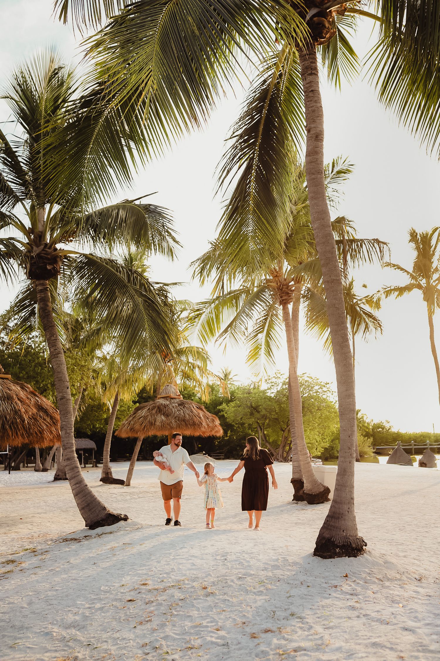 Anna Maria Island family photographer creating timeless beach portraits filled with genuine smiles and connection.