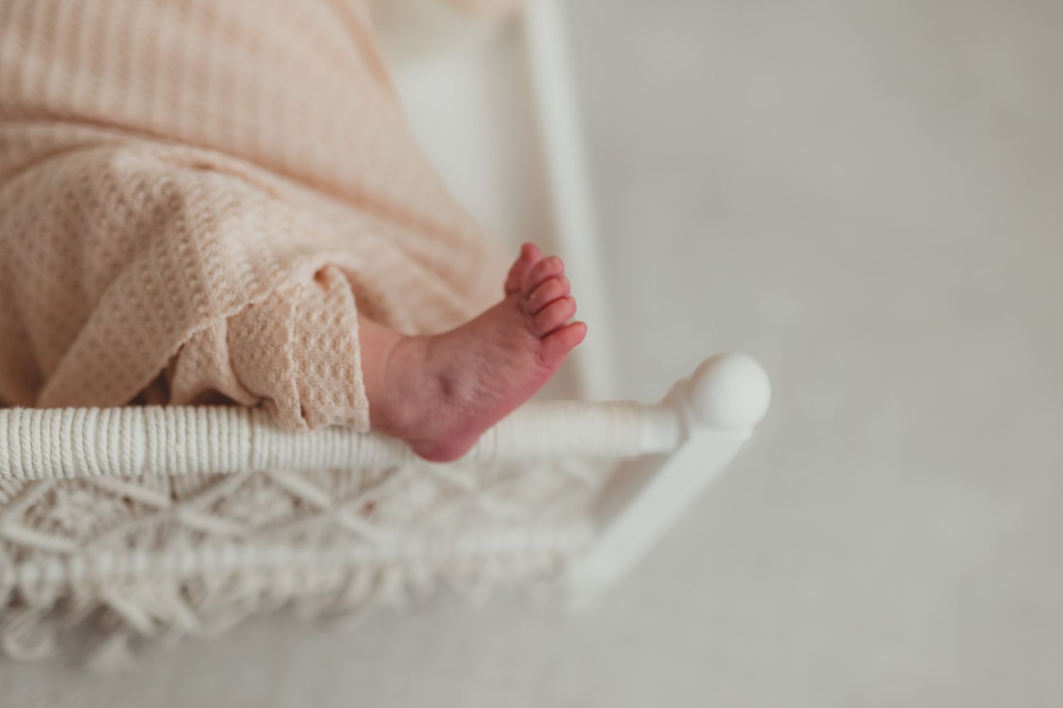 in-home newborn photography session in Sarasota Florida lifestyle baby photos
Newborn baby wrapped in natural light session in Lakewood Ranc