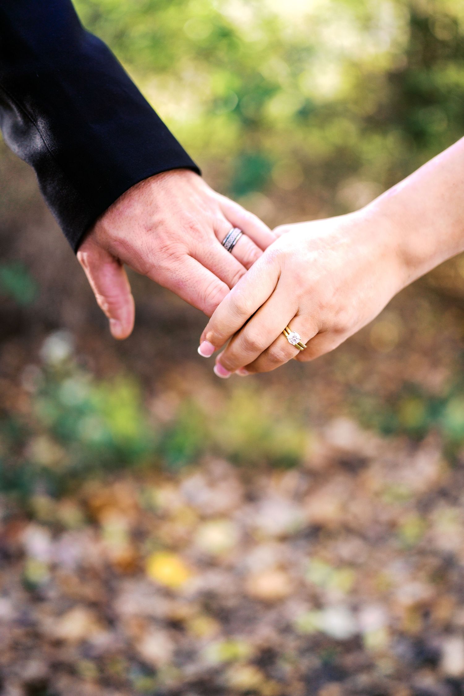 philadelphia wedding philadelphia wedding bride and groom holding hands wedding rings