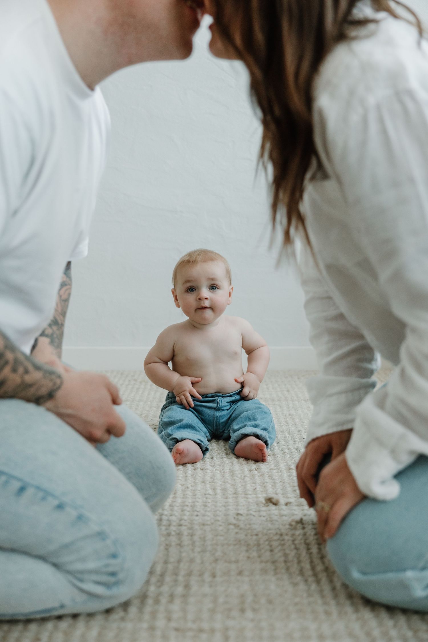 Natural family photography session capturing connection indoor studio Wagga Wagga