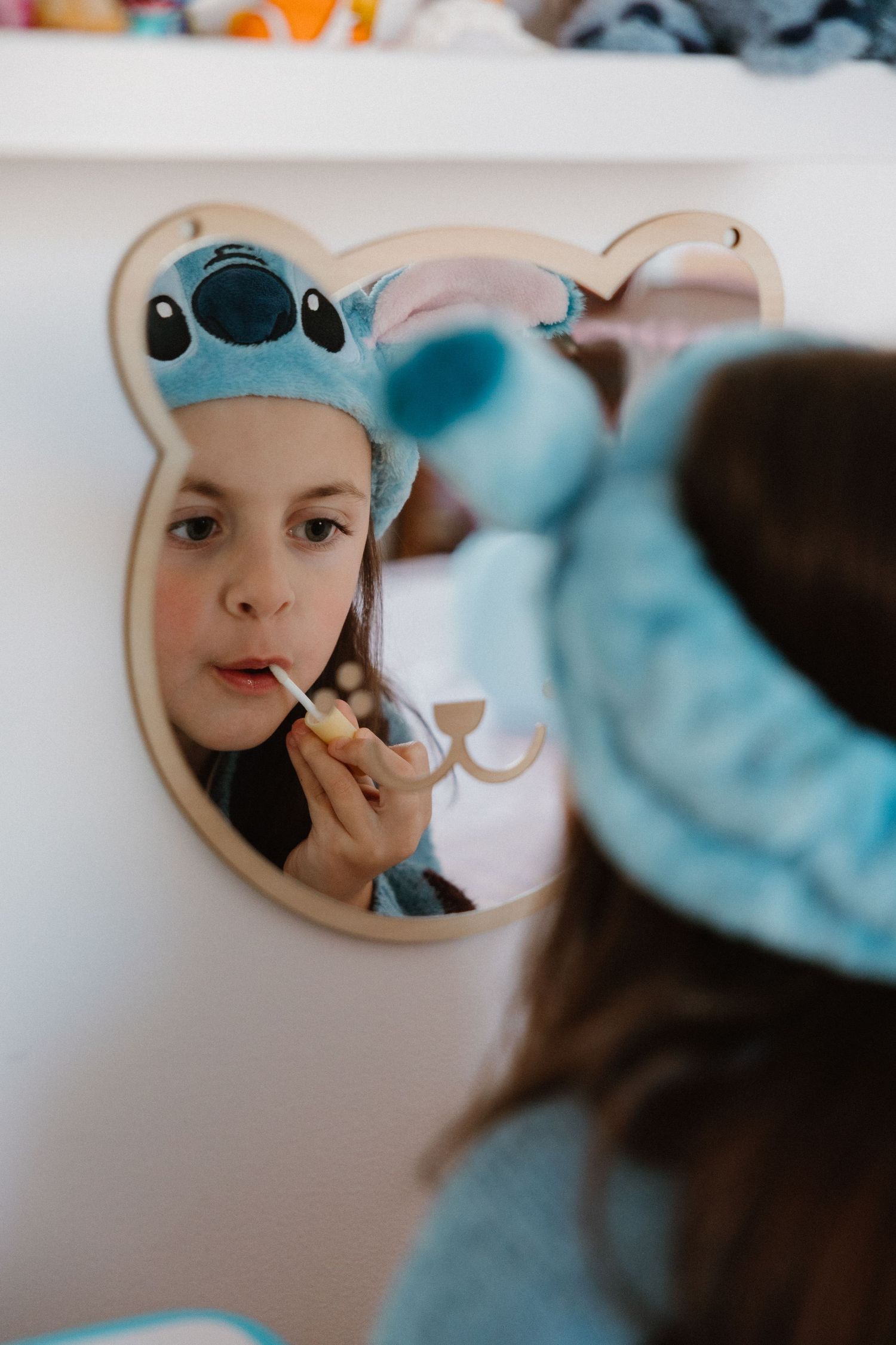 childhood bedroom photography session capturing childhood memories family photography lily and stitch inspired
