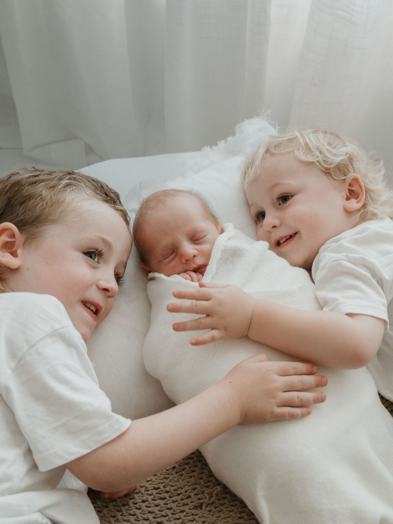 Newborn studio photography brothers indoor Wagga Wagga capturing connection
