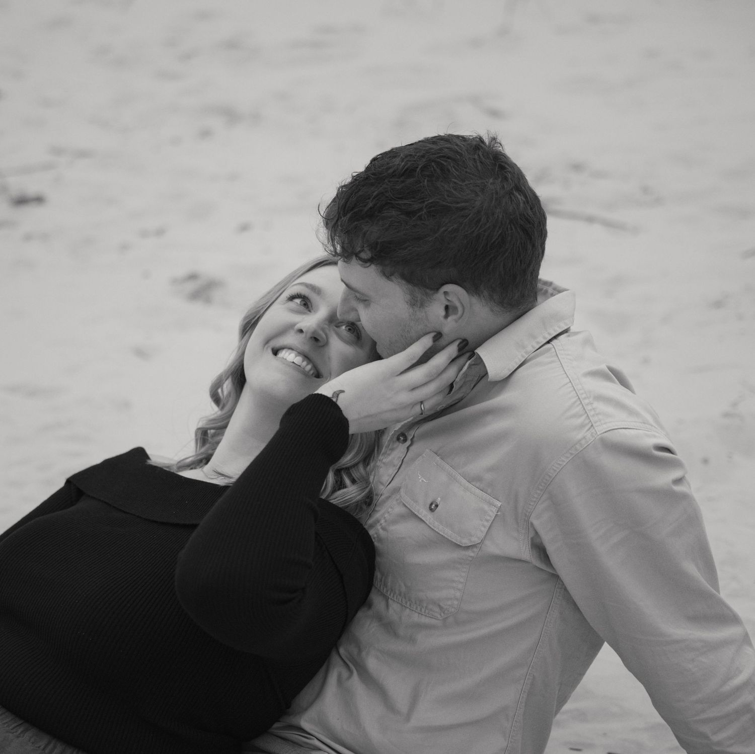 couple embracing west beach adelaide
