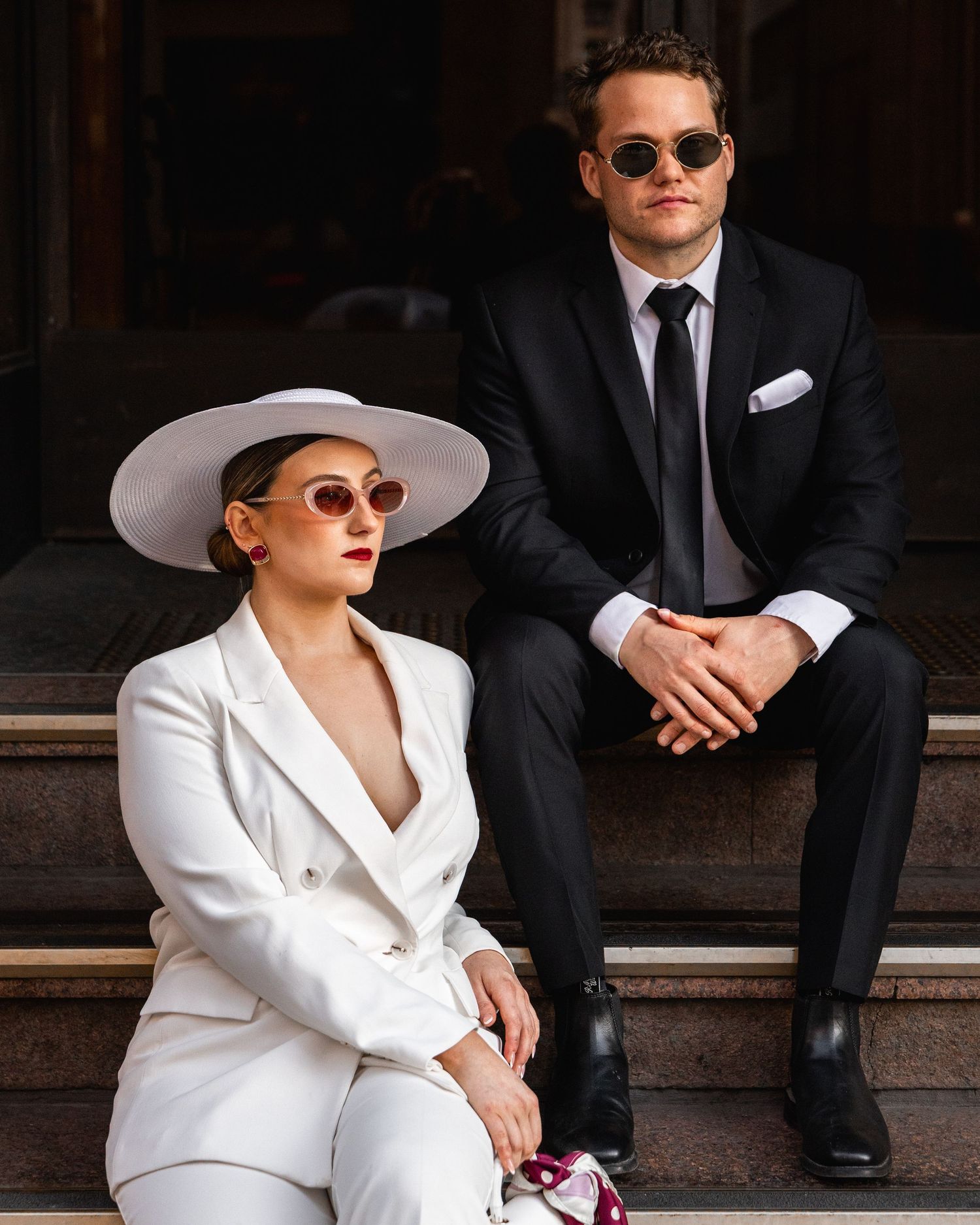 elopement couple laughing adelaide city couple sitting on stairs