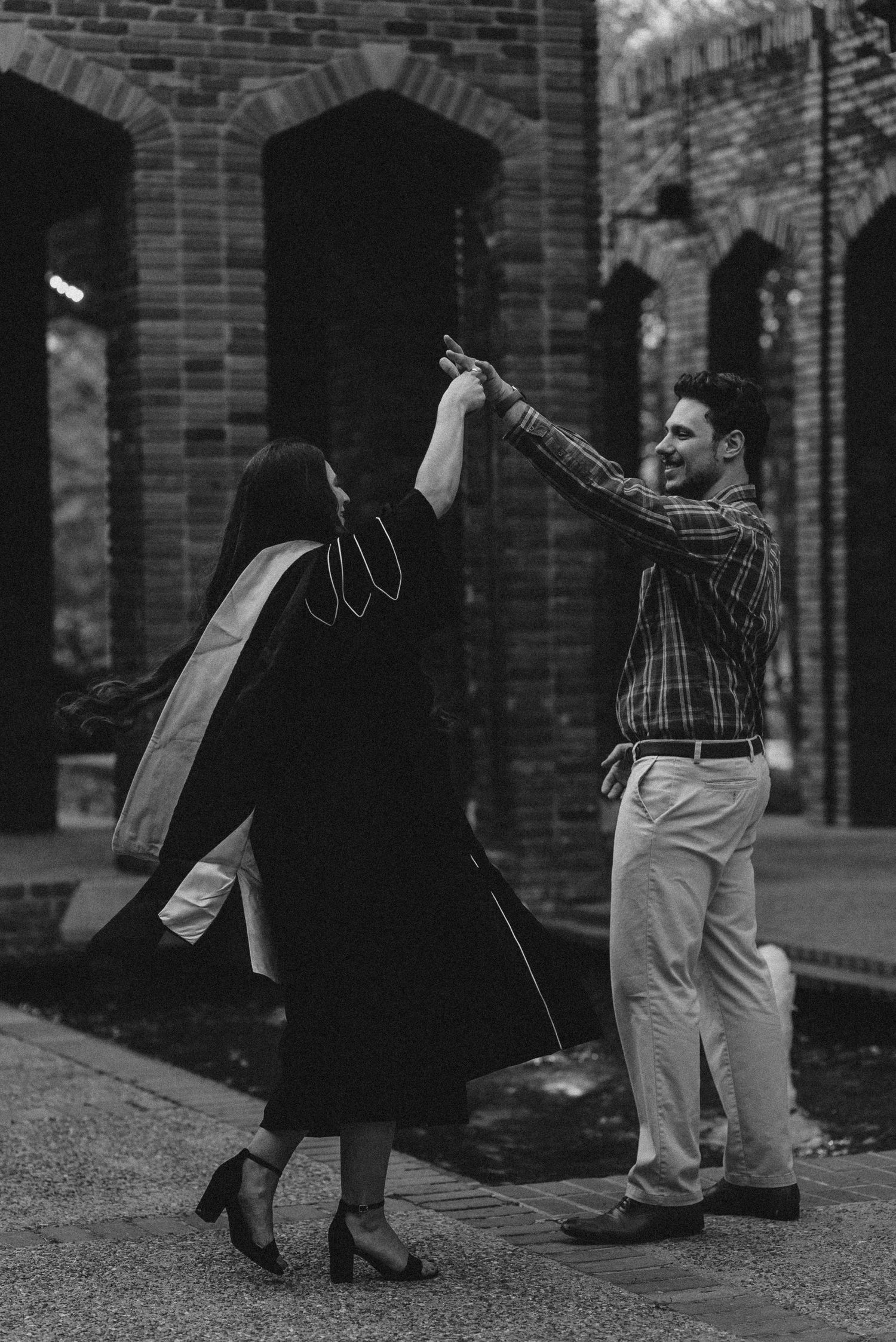 Black and white photography of a couple dancing in the Chapel of Memories at Mississippi State University.