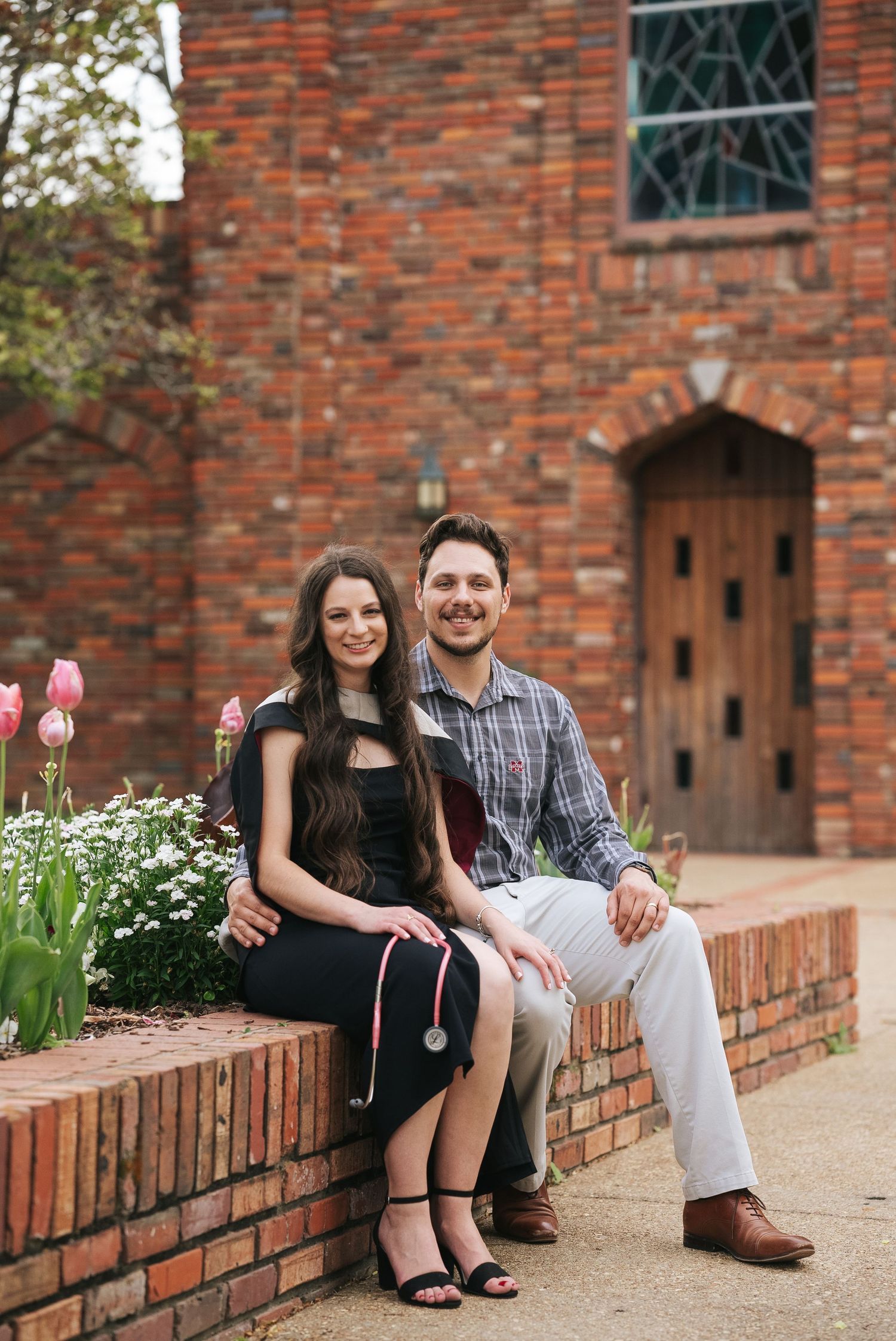 DVM graduation couple portrait at Mississippi State University’s Chapel of Memories, featuring a veterinary graduate and her husband.