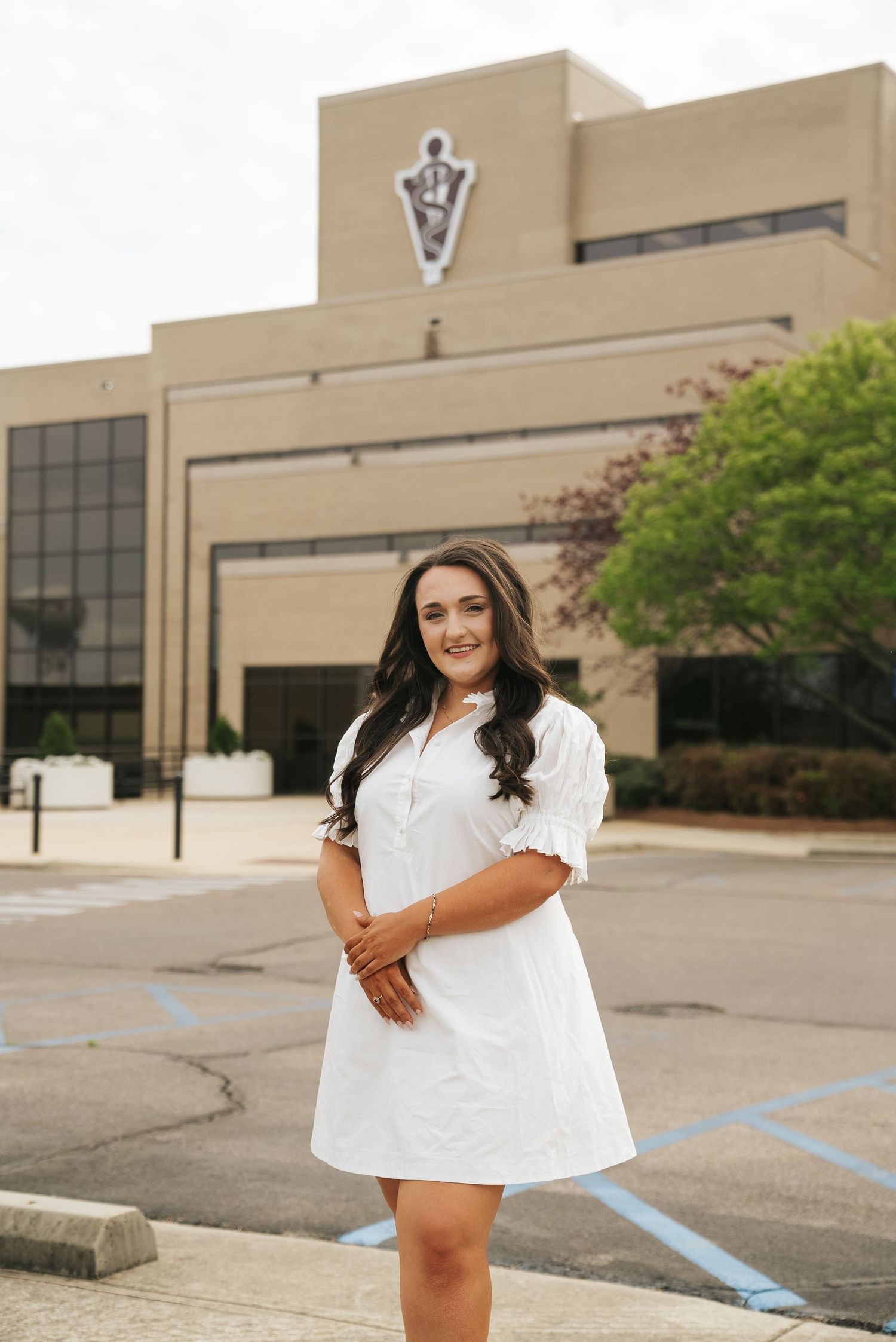 DVM graduation portrait photography in Starkville, MS, featuring a veterinary graduate at Mississippi State CVM.