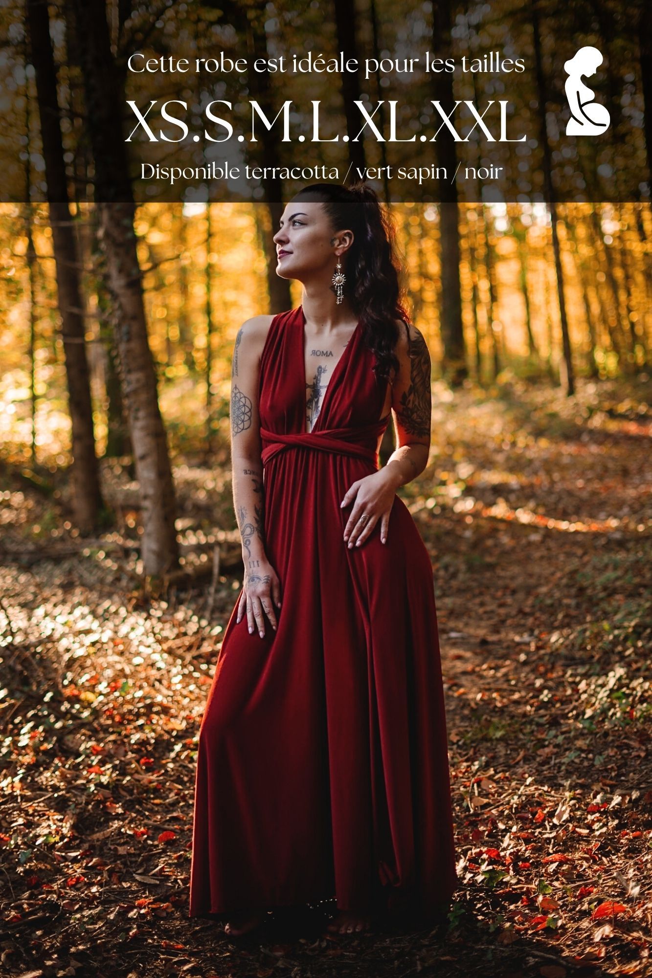 Woman in red maxi dress poses in autumn forest, available in XS-XXL in terracotta, forest green, and black.