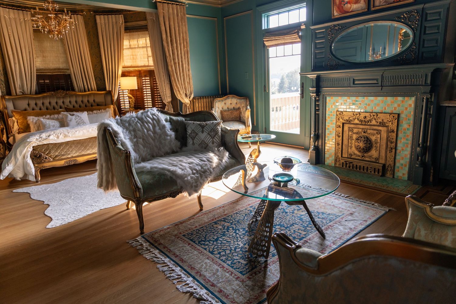 Interior views of luxurious period bedroom featuring ornate furniture, detailed woodwork, and traditional decor.