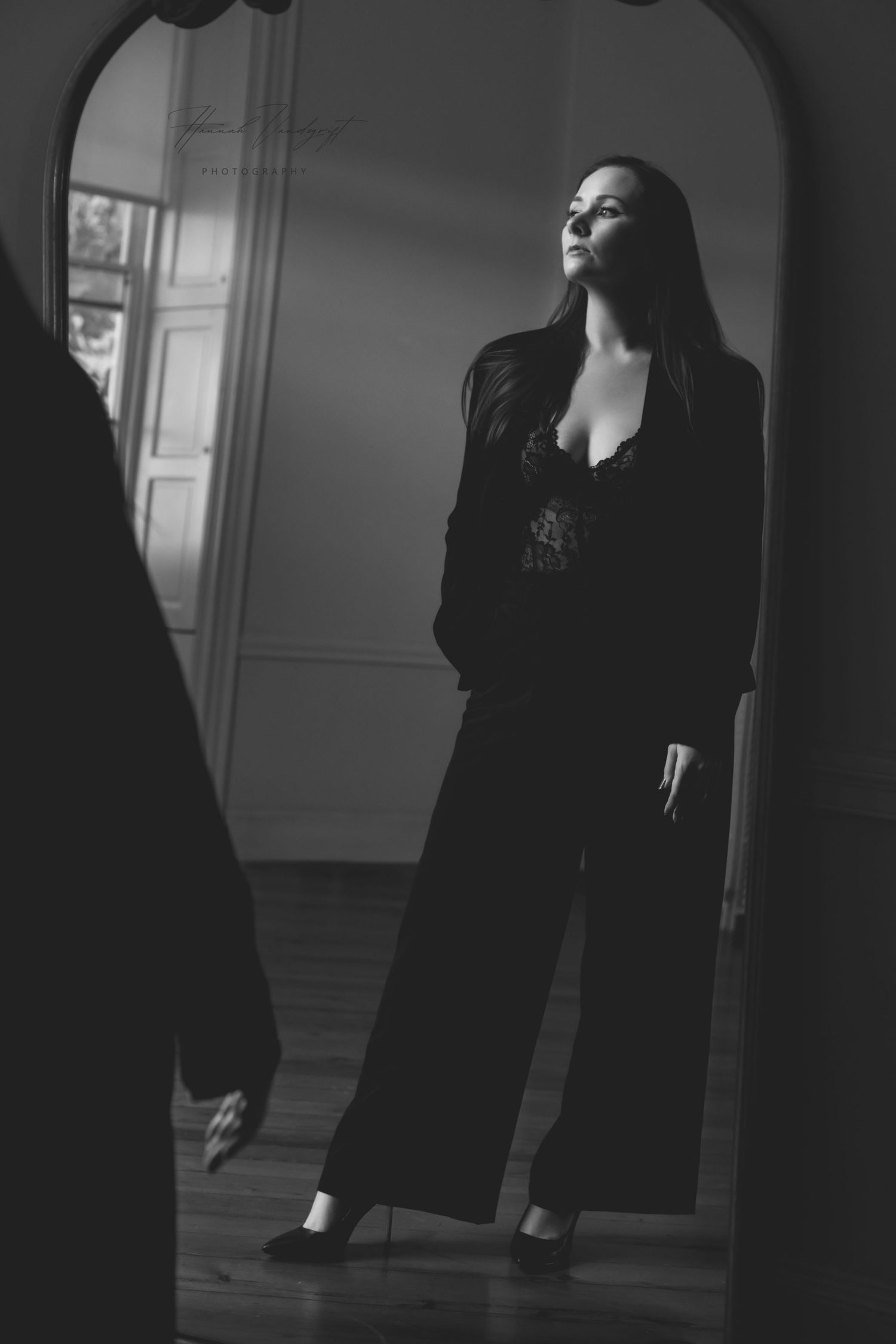 Dramatic black and white series of expressive movements in an empty room.