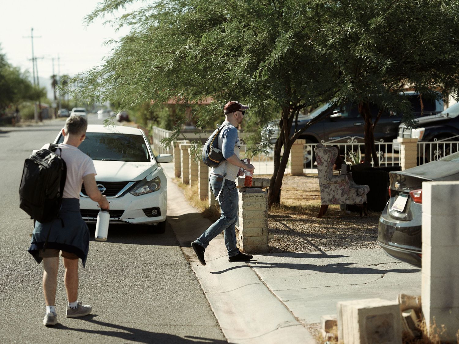 Canvassers walk a Maricopa County neighborhood during Harris-Walz campaign outreach, Oct. 2024. (Afonso Salcedo)