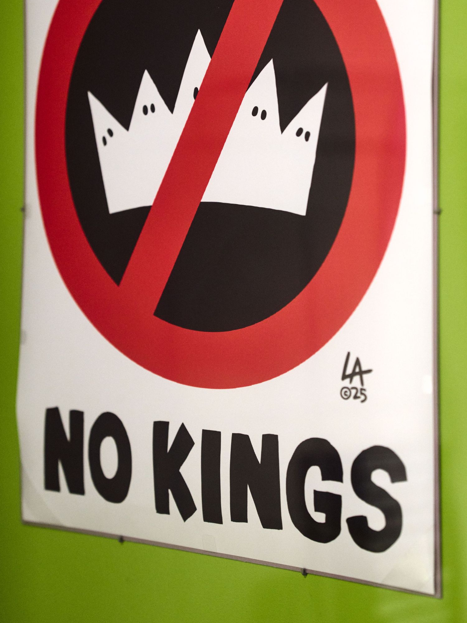 A 2025 “No Kings” poster by Lalo Alcaraz on the protest wall of the Autry’s “Life, Liberty, and Los Angeles.”