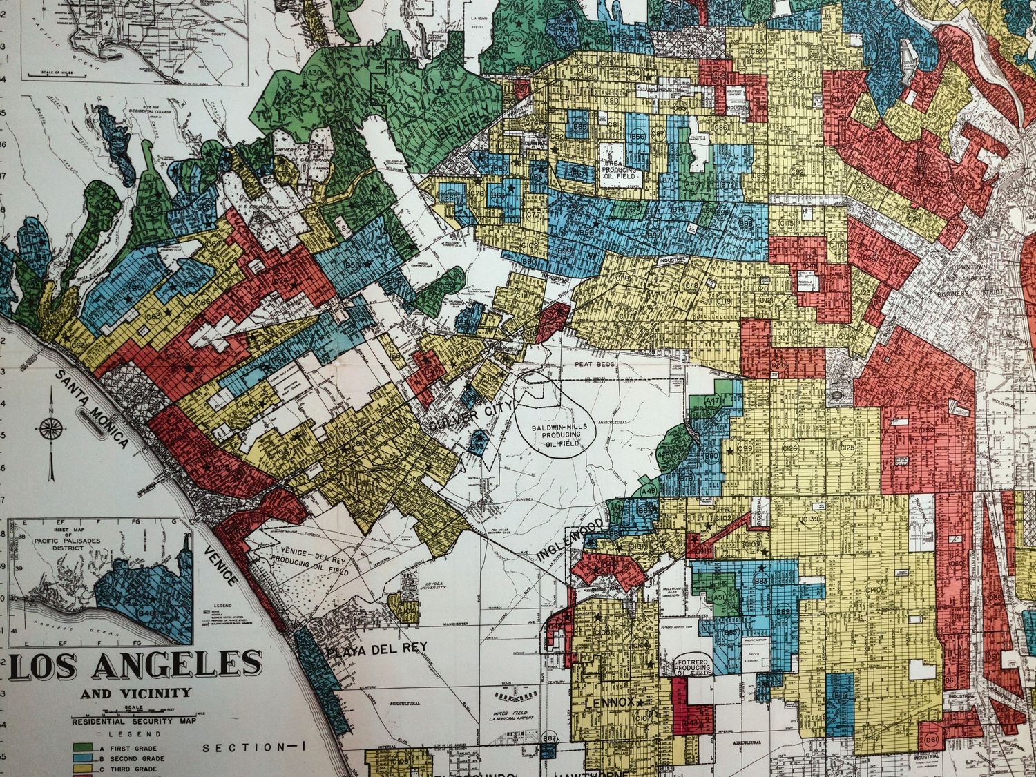 A color-coded 1939 federal redlining map grading Los Angeles neighborhoods for lending, at the Autry’s “Life, Liberty, and Los Angeles.”