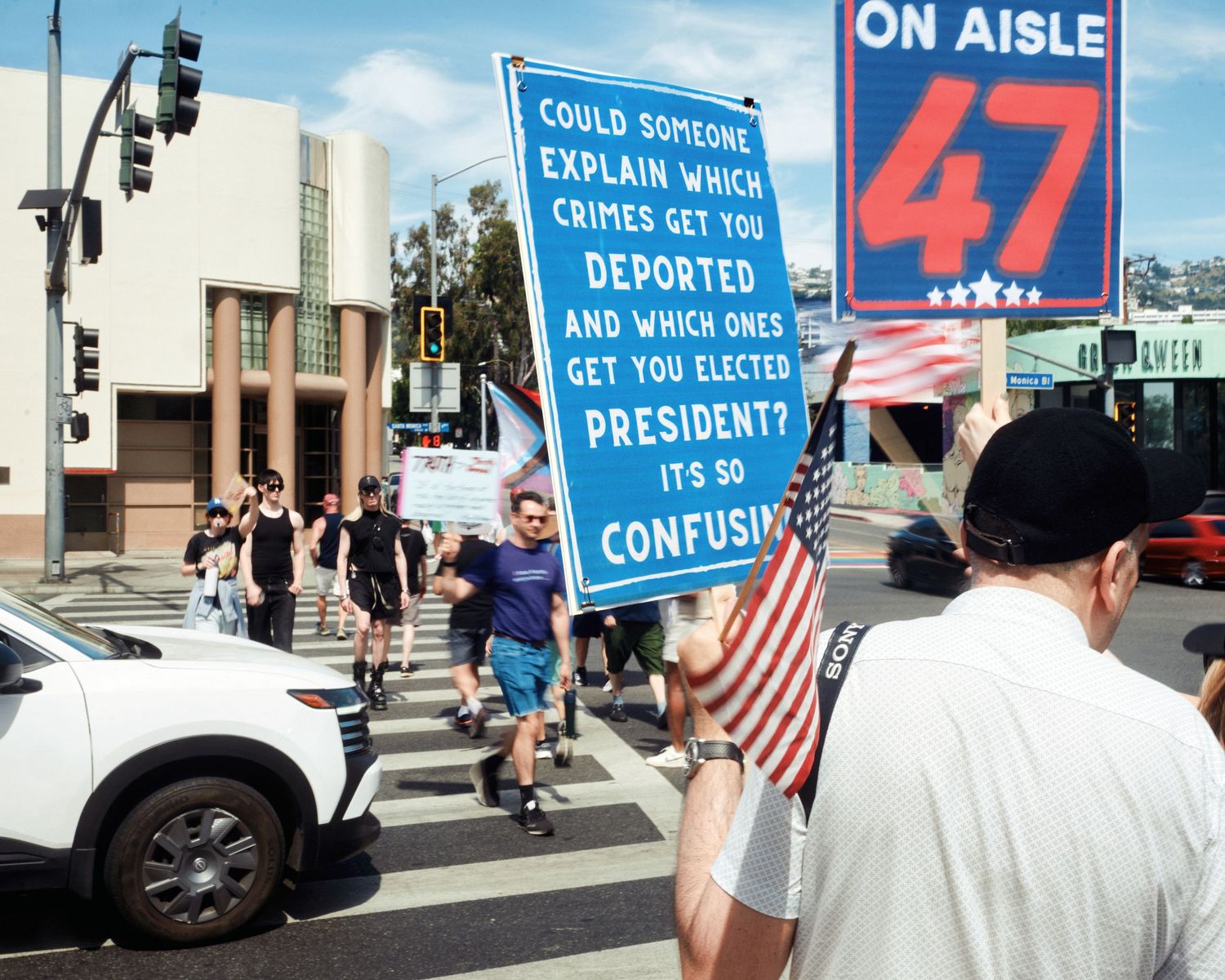 Protesters march through West Hollywood during the No Kings day of action, March 28, 2026. (Afonso Salcedo)
