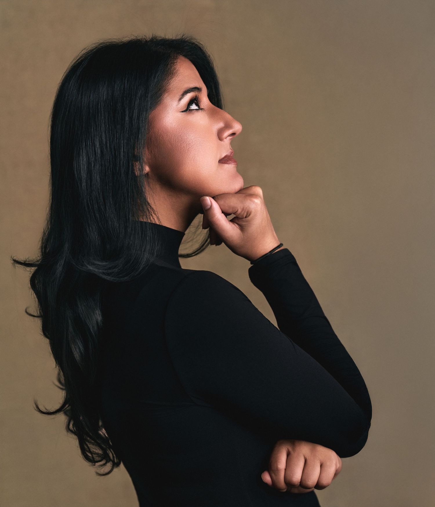 Profile portrait of Jasmeet Sidhu with warm studio lighting and contemplative pose — portrait by Los Angeles photographer Afonso Salcedo