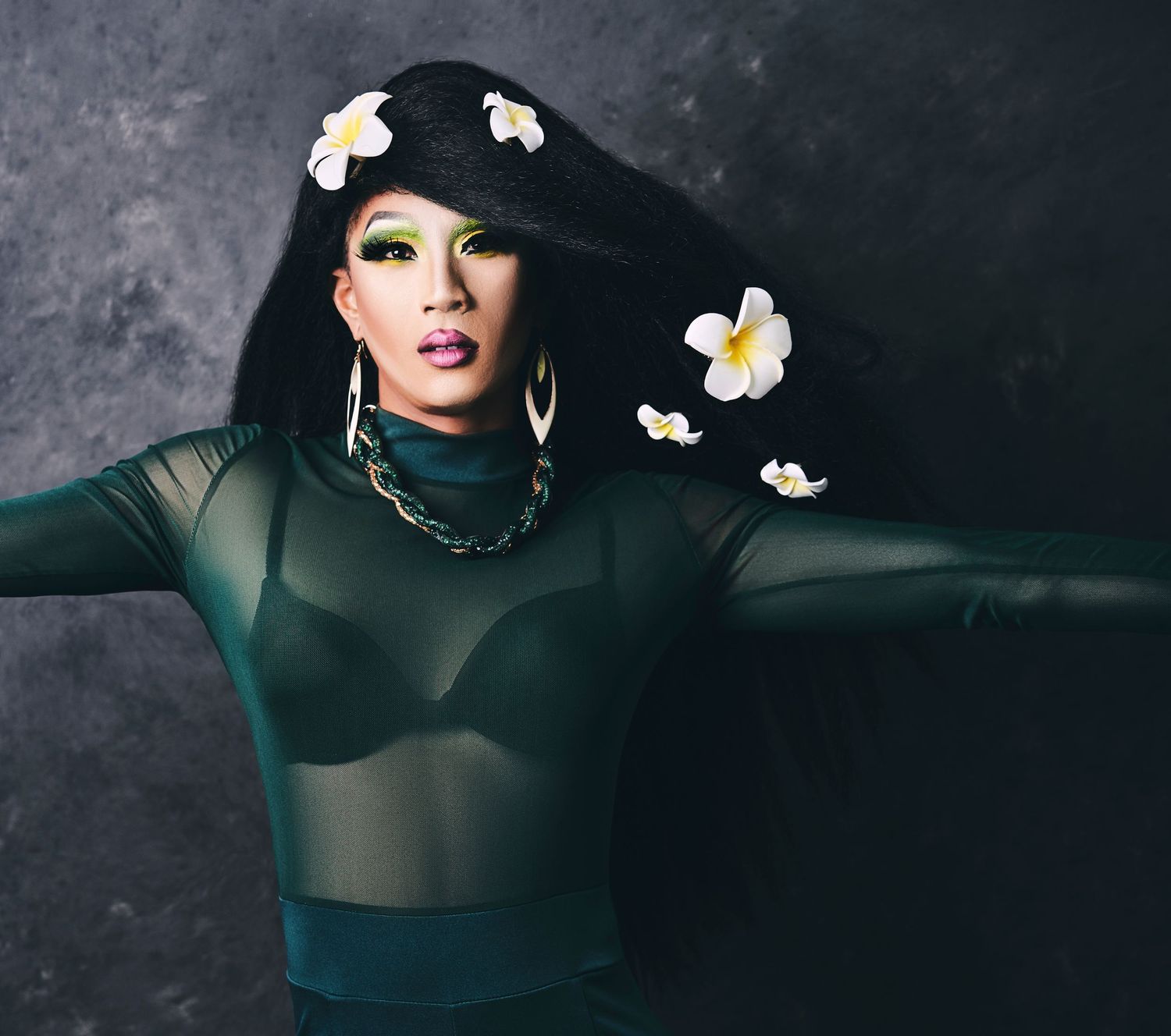 Styled editorial portrait with dramatic makeup and floral styling — creative portrait by Los Angeles photographer Afonso Salcedo