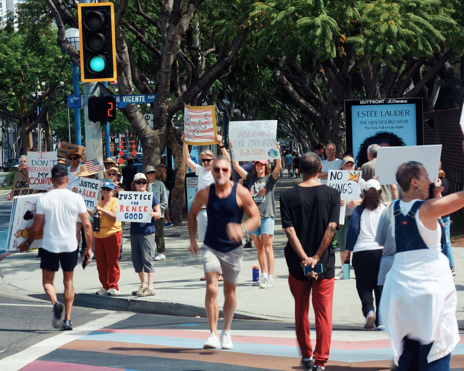 Demonstrators march along Santa Monica Blvd. during the No Kings protest, West Hollywood, March 28, 2026. (Afonso Salcedo)