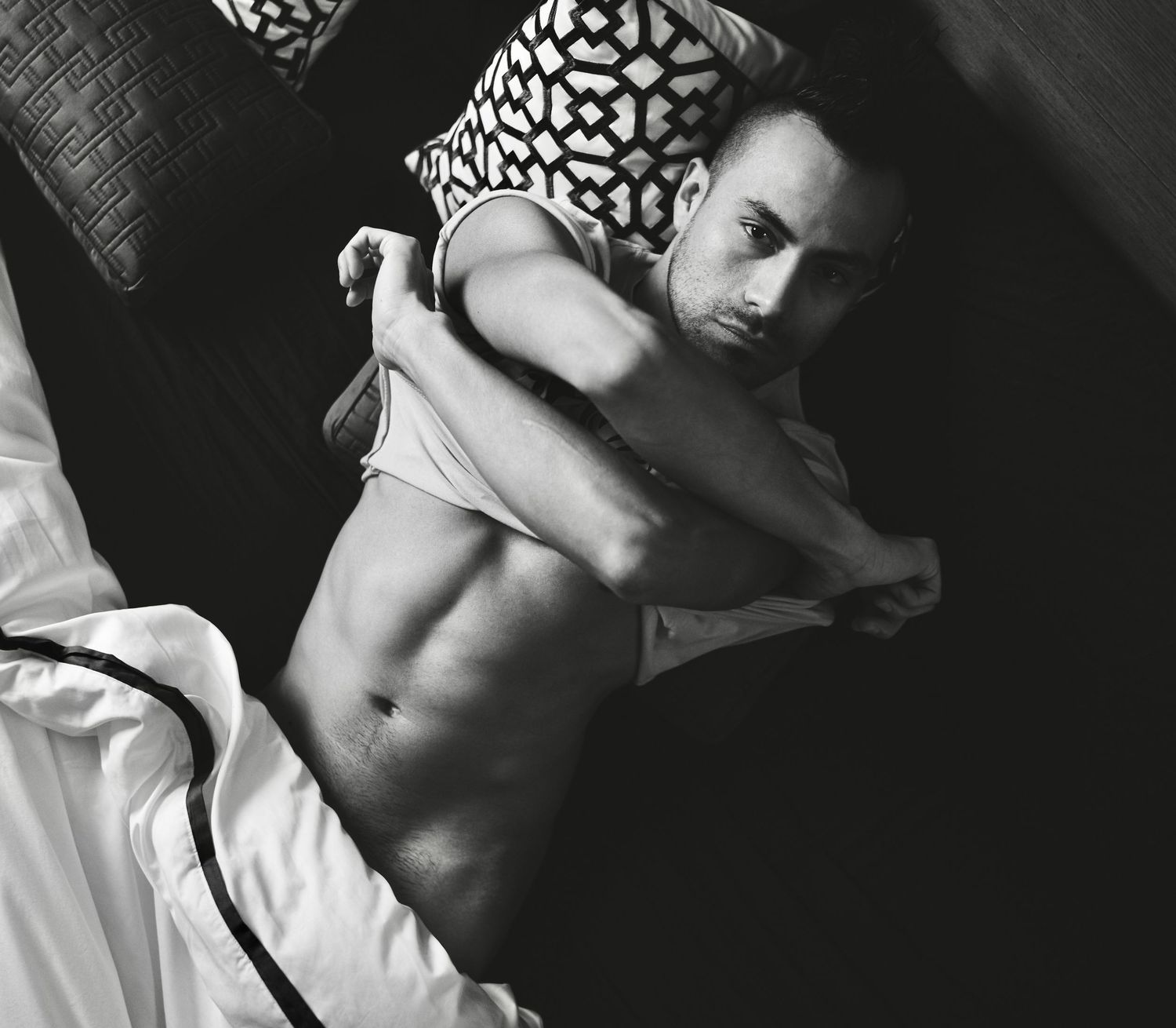 Black and white boudoir editorial with dramatic natural light — creative portrait by Los Angeles photographer Afonso Salcedo