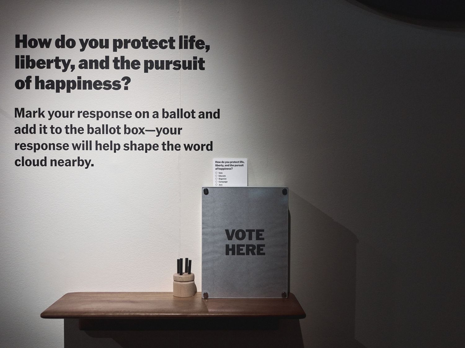 A visitor ballot station stenciled VOTE HERE near the exit of the Autry’s “Life, Liberty, and Los Angeles.”