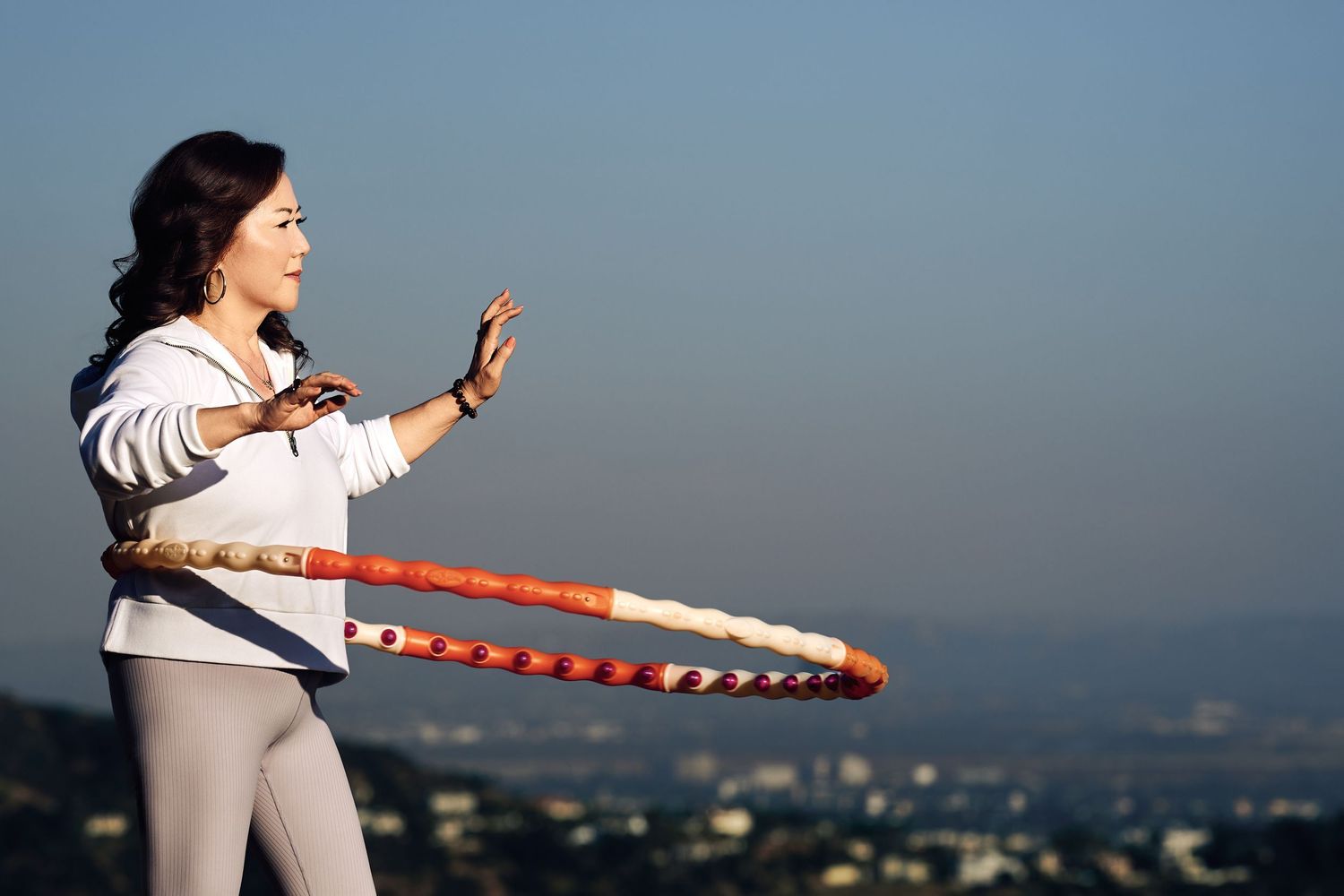 Sunny Han-Jeon hula hooping on Mt. Wilson Trail in Sierra Madre, photographed for the Journal of Corporate Renewal.