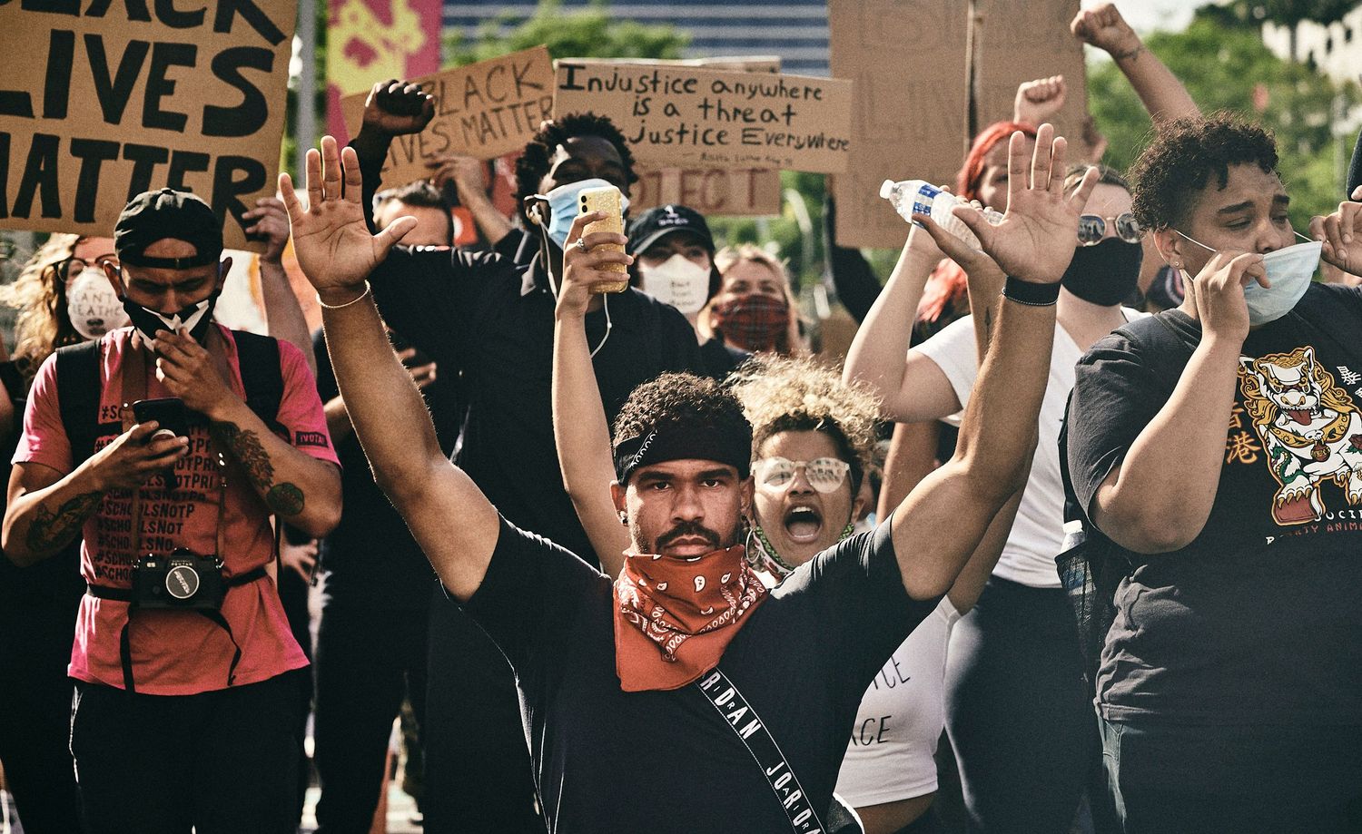 Demonstrators raise their hands during a Black Lives Matter march in Los Angeles, June 2020. (Afonso Salcedo)