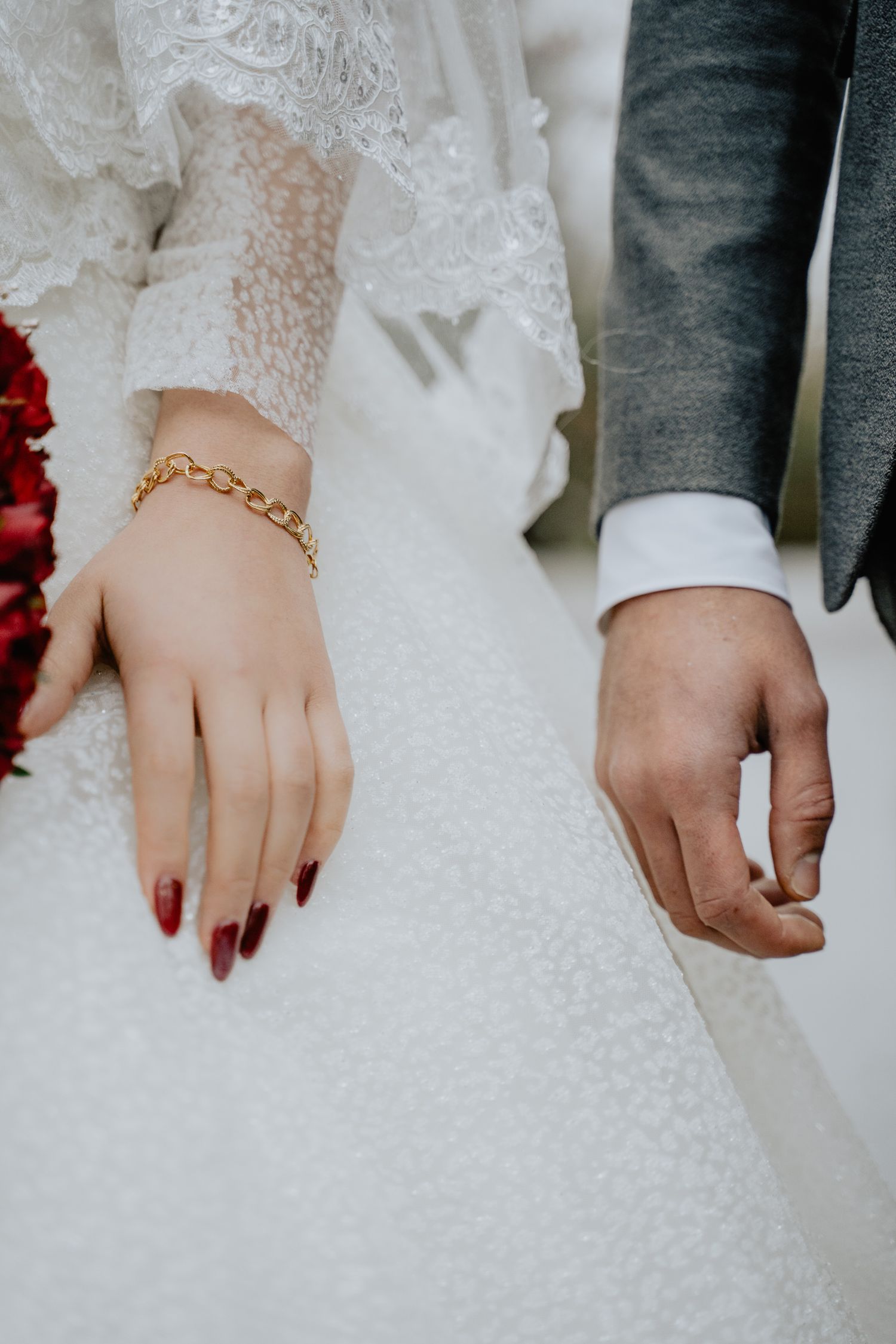 wedding couple portrait shot showing man and woman side hands