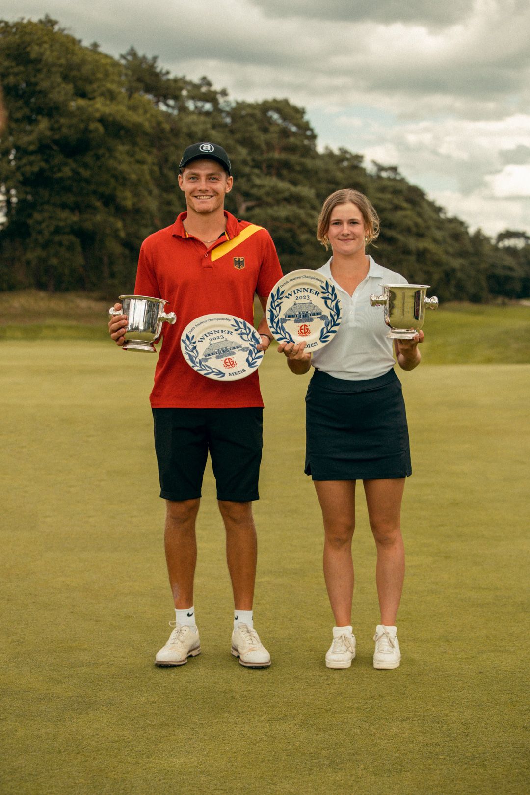 portrait shot of 2 golf champions