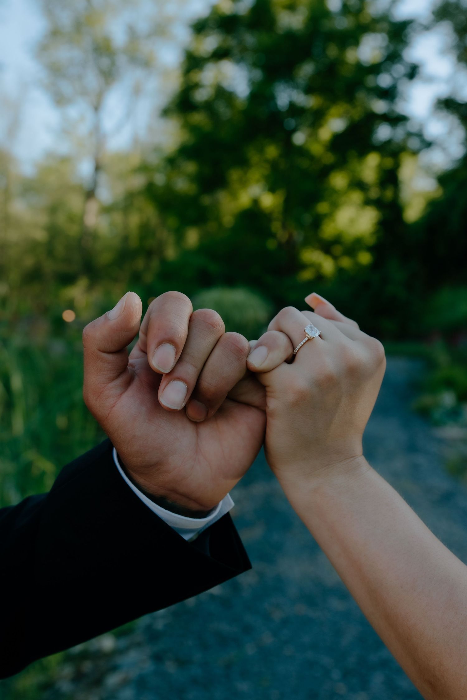 Two hands in a pinky promise. Shot at The Barn at Twiggys in Middletown, New York.