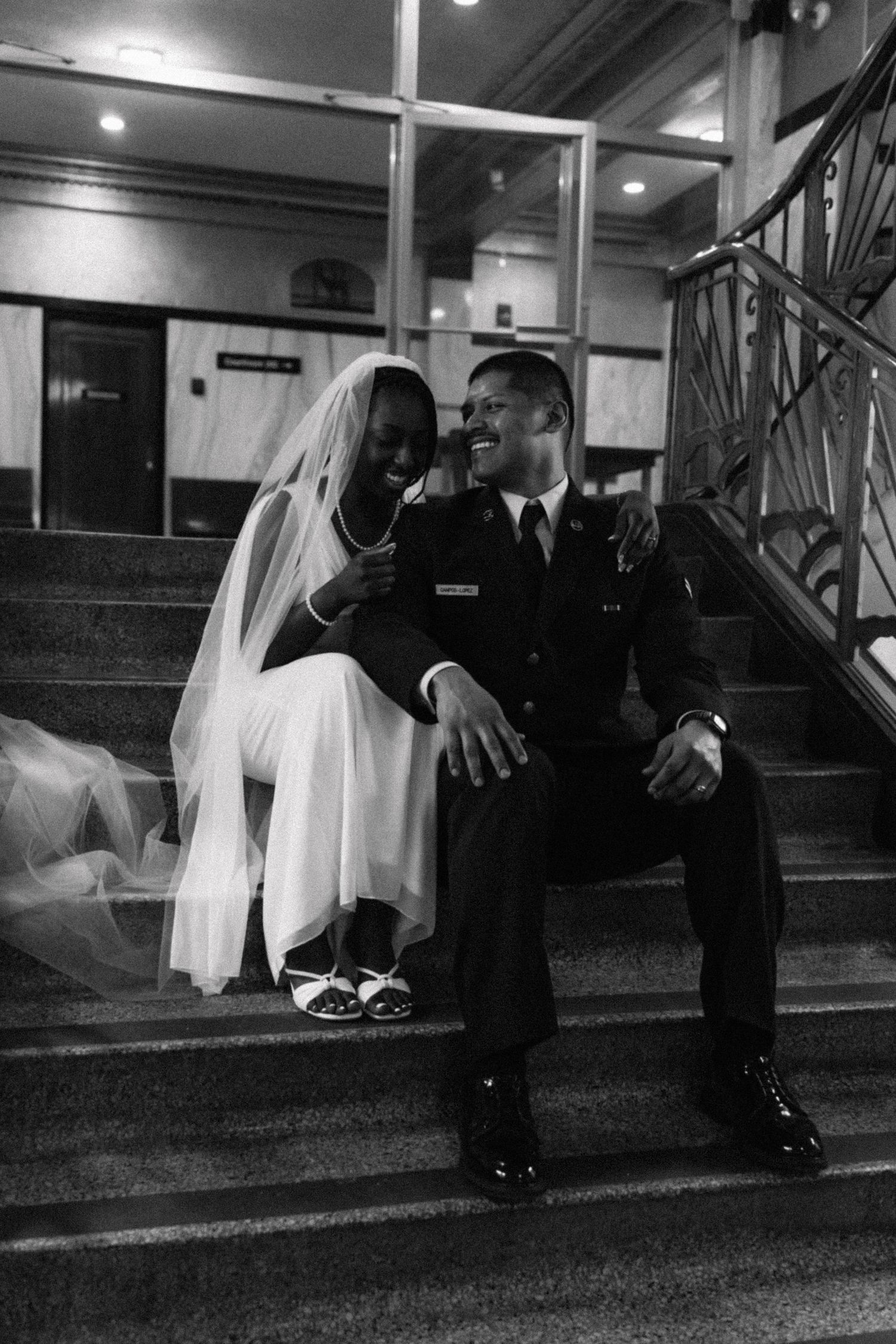 Black and white photo series of a couple on steps in formal wedding attire.