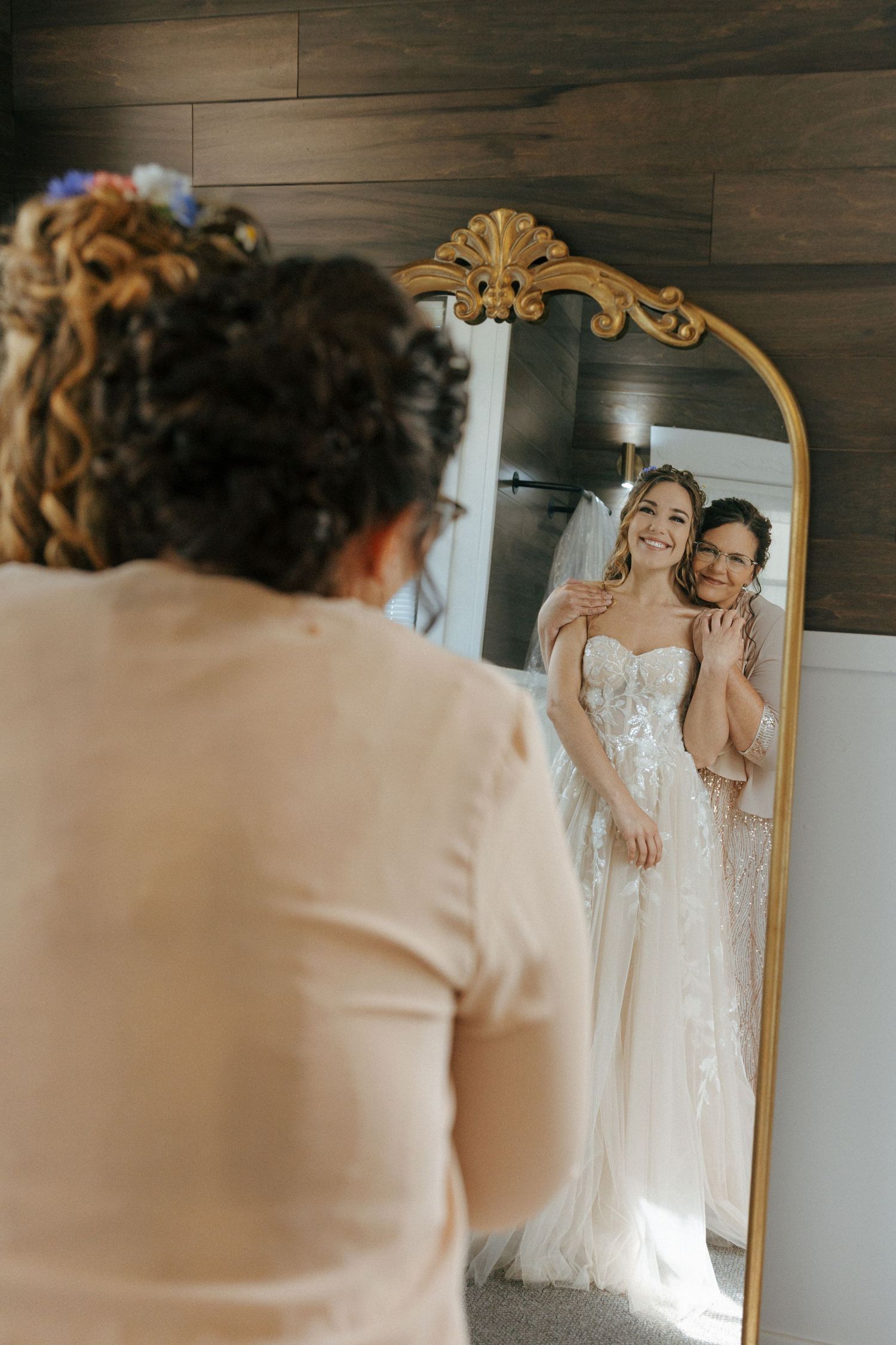 mom and daughter getting ready during her wedding day
