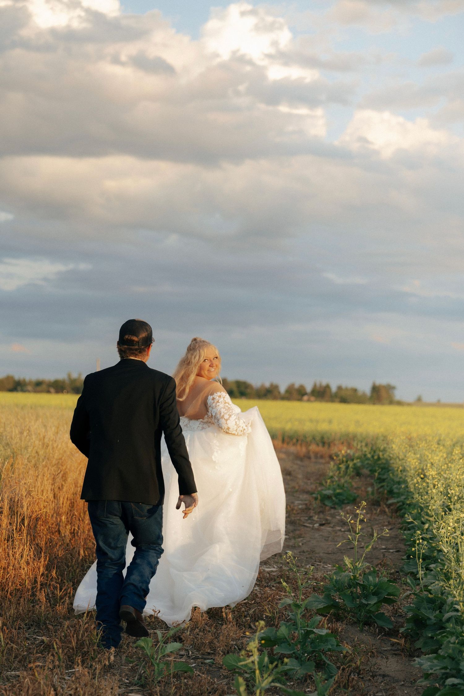 bride and groom running at sunset in Garrison