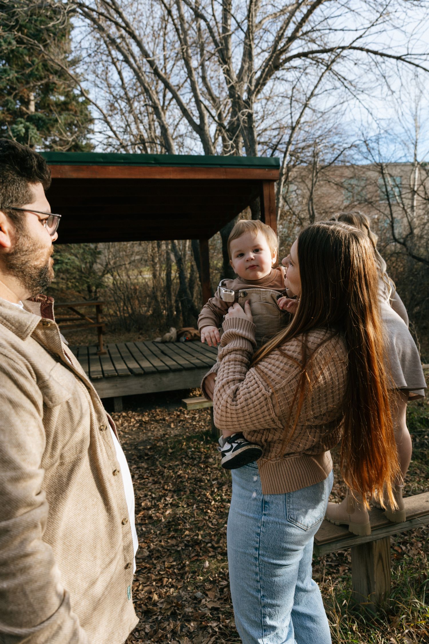 Mother holding child during family session in Bismarck North Dakota